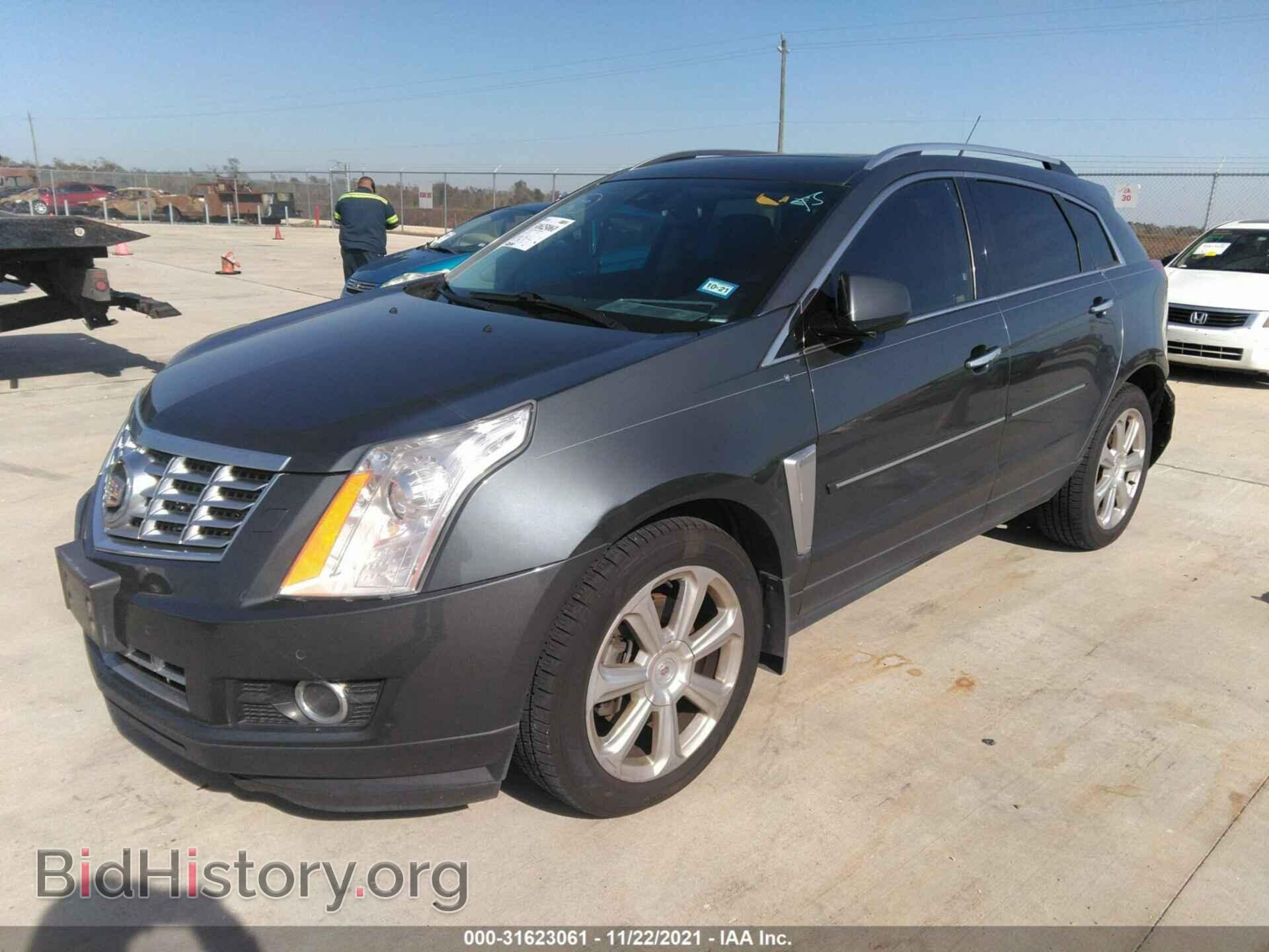 2013 CADILLAC SRX - VIN: 3GYFNDE3XDS596412 - Фото 2