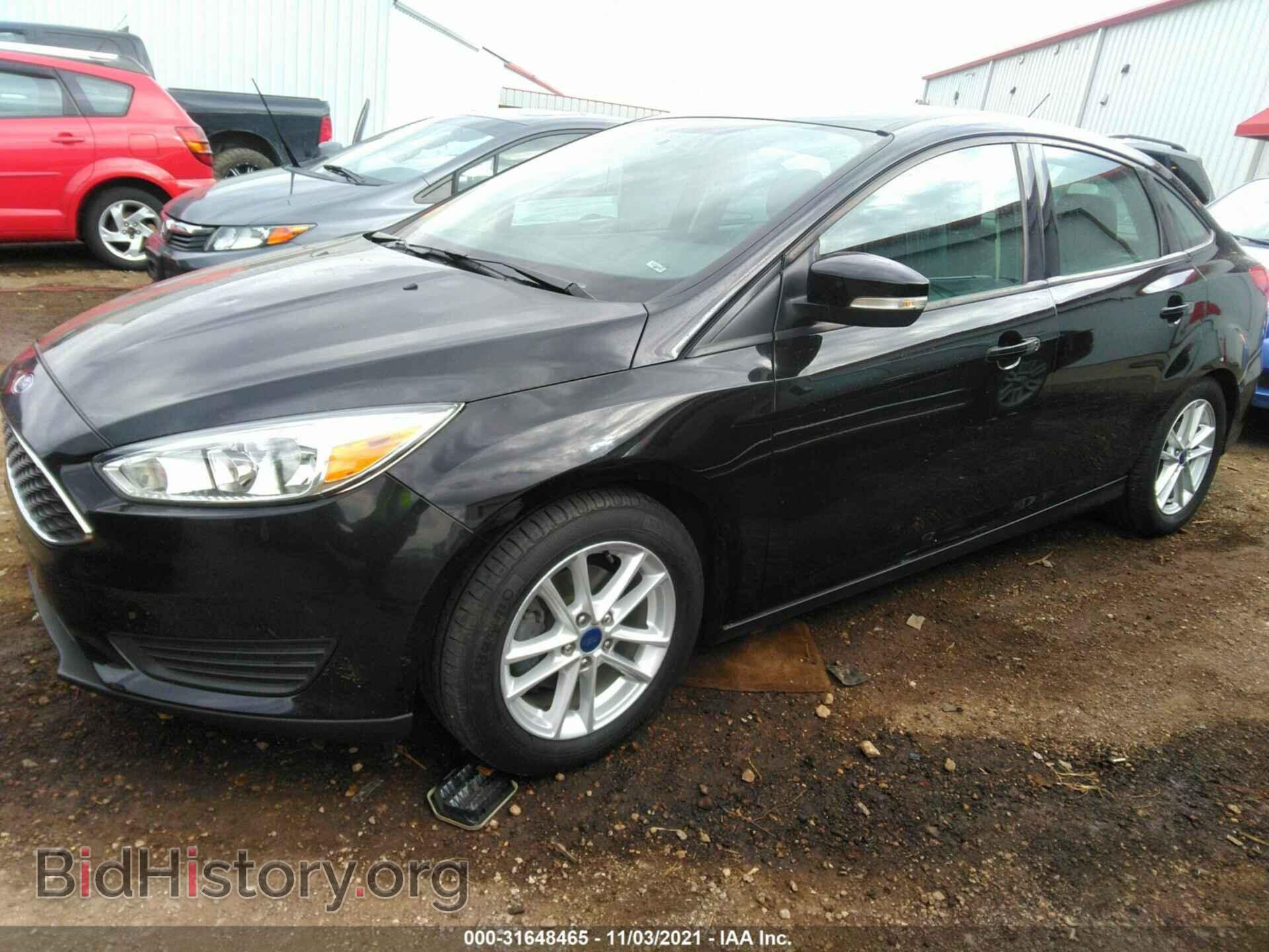 2016 FORD FOCUS - VIN: 1FADP3F20GL318562 - Фото 2