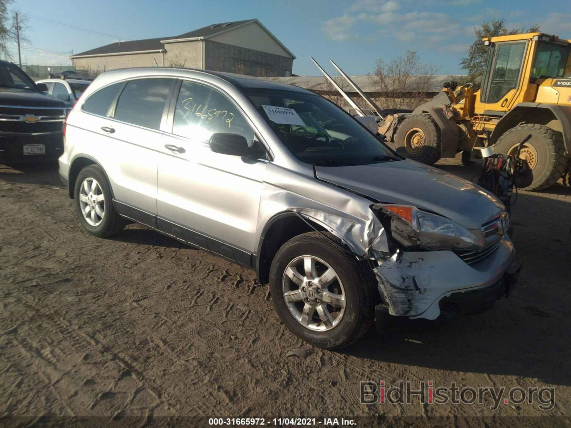 Photo JHLRE48599C003221 - HONDA CR-V 2009