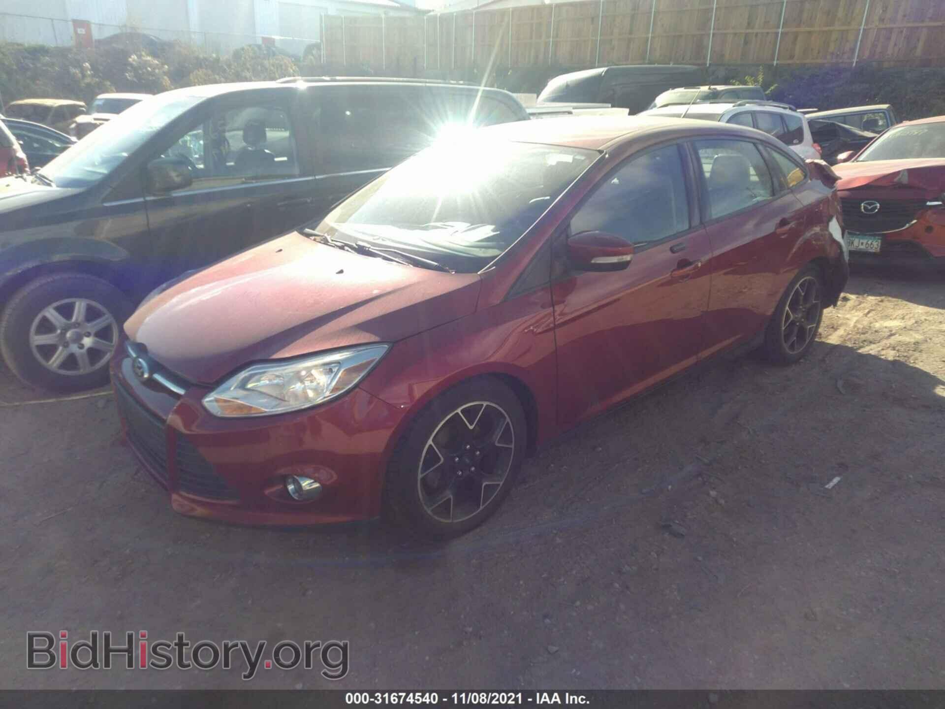 2014 FORD FOCUS - VIN: 1FADP3F28EL413609 - Photo 2