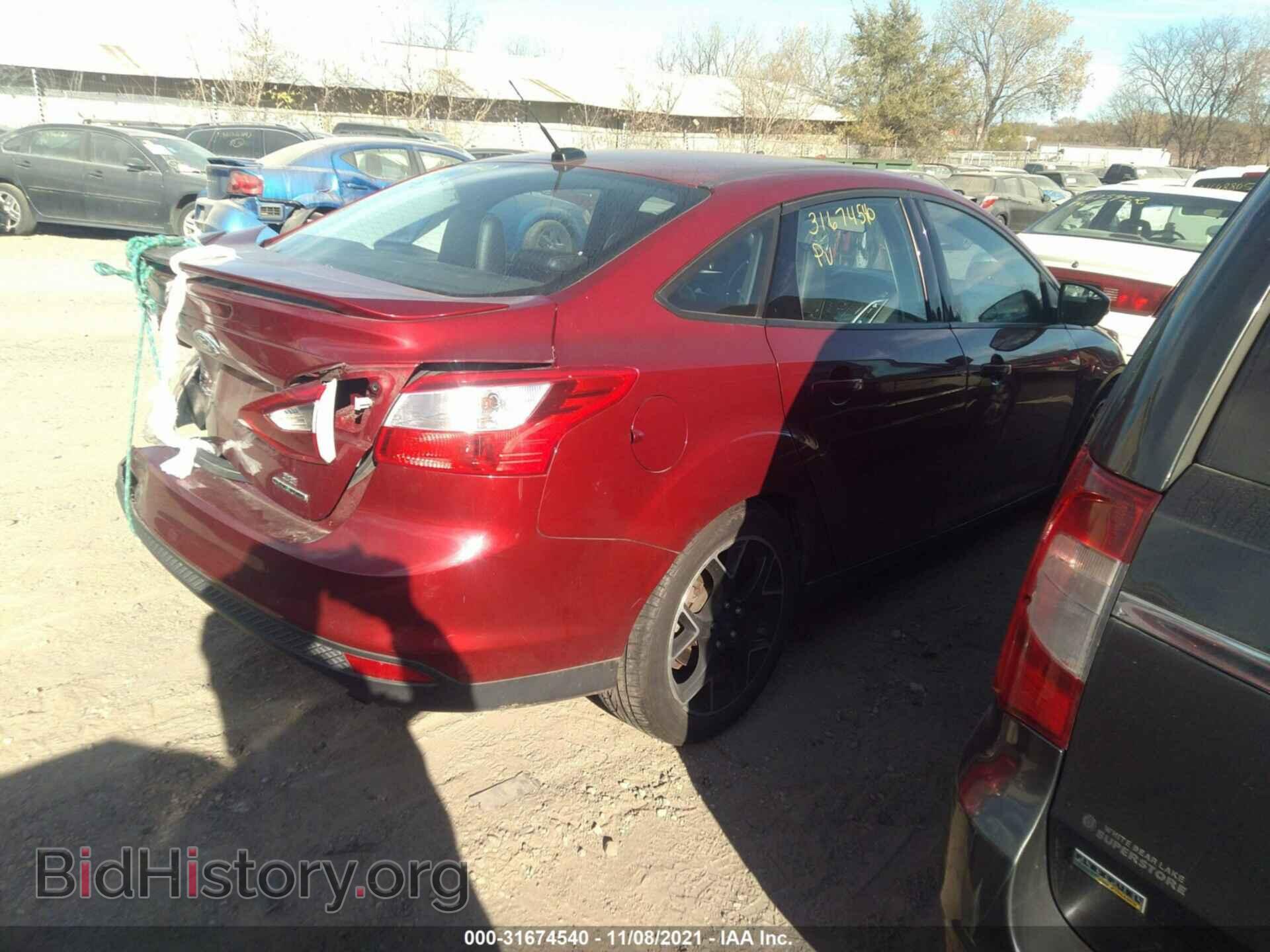 2014 FORD FOCUS - VIN: 1FADP3F28EL413609 - Photo 4