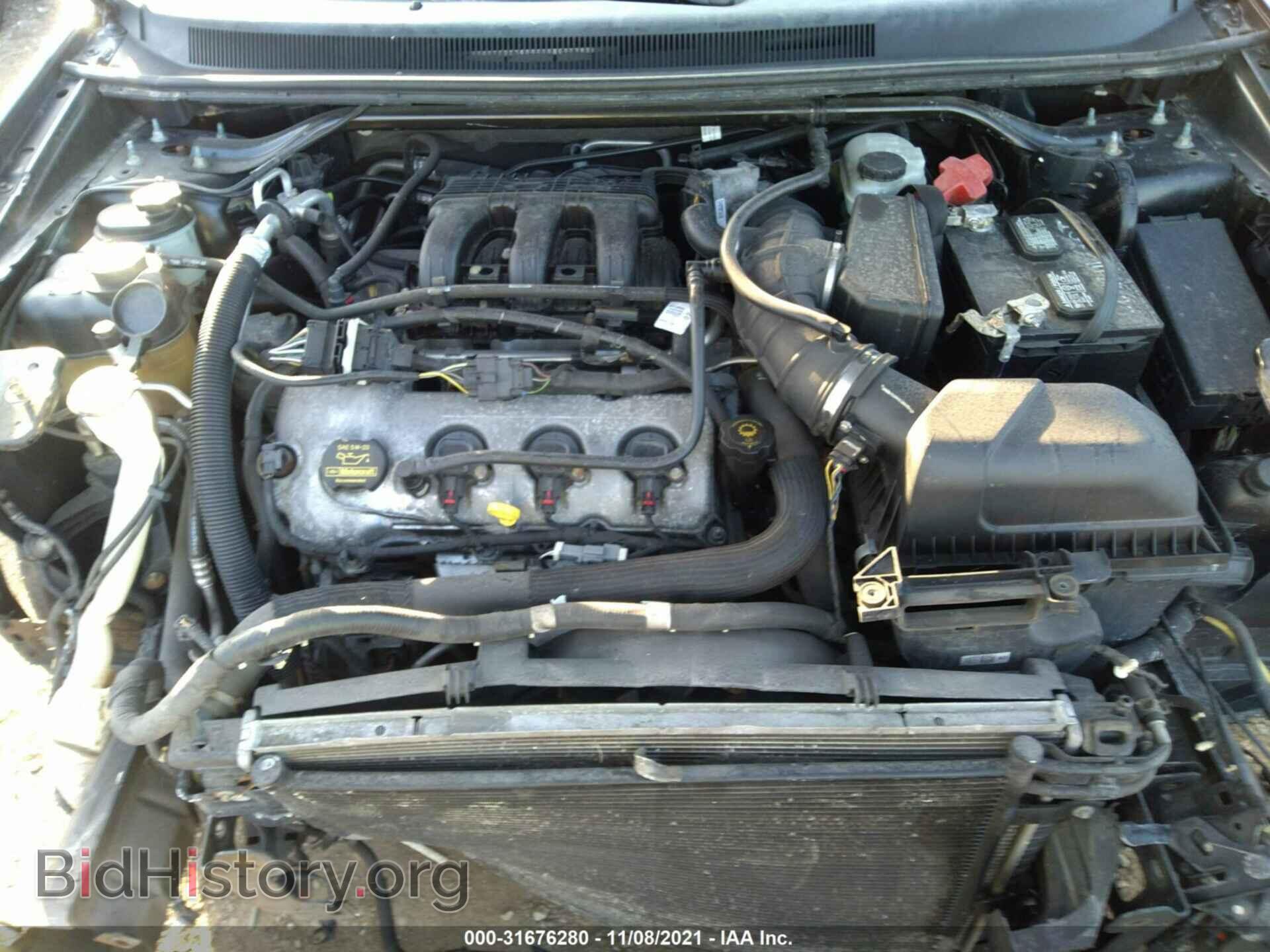 2009 FORD TAURUS X - VIN: 1FMDK06W79GA05364 - Фото 10
