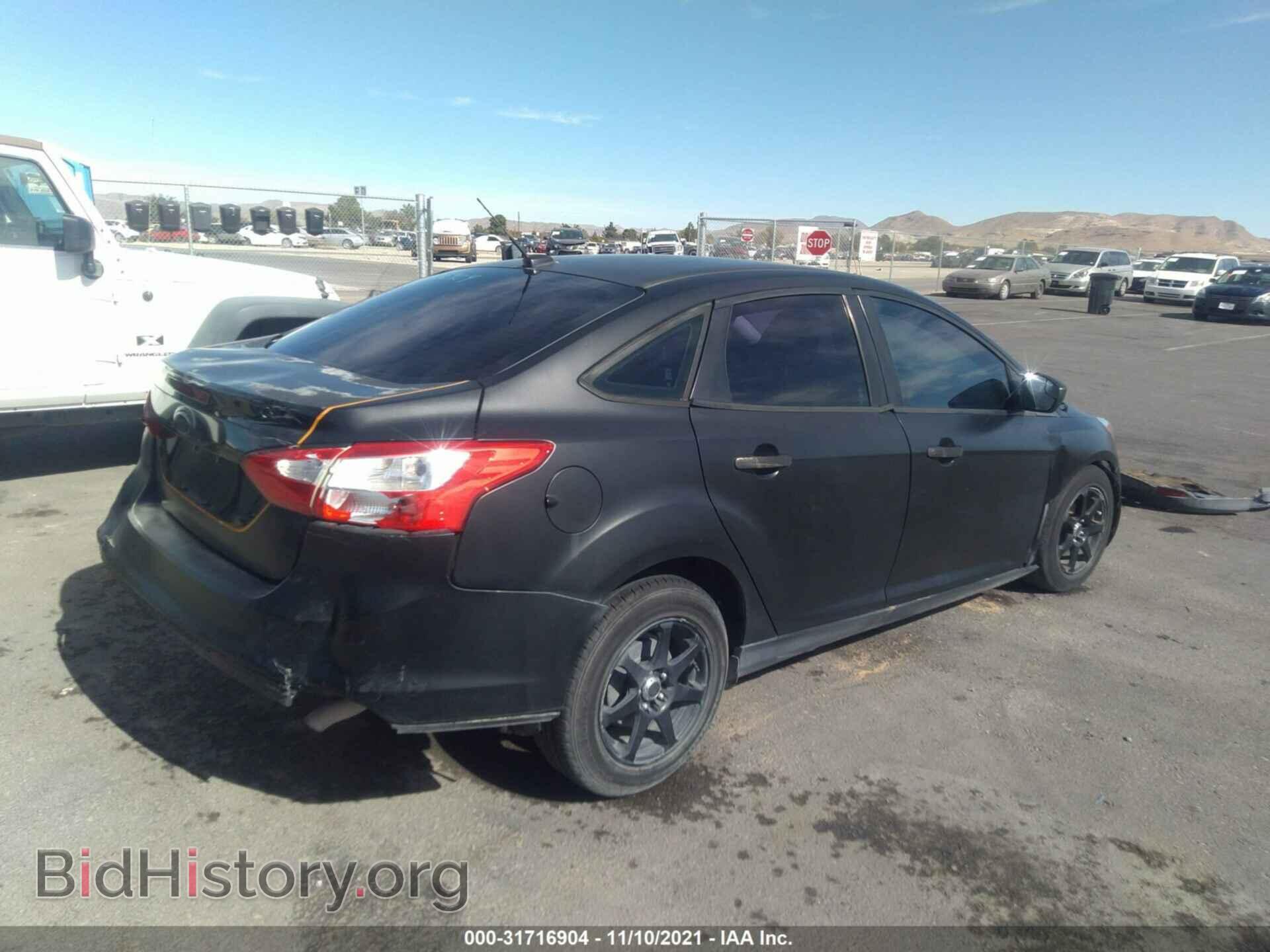 2014 FORD FOCUS - VIN: 1FADP3E27EL196328 - Photo 4