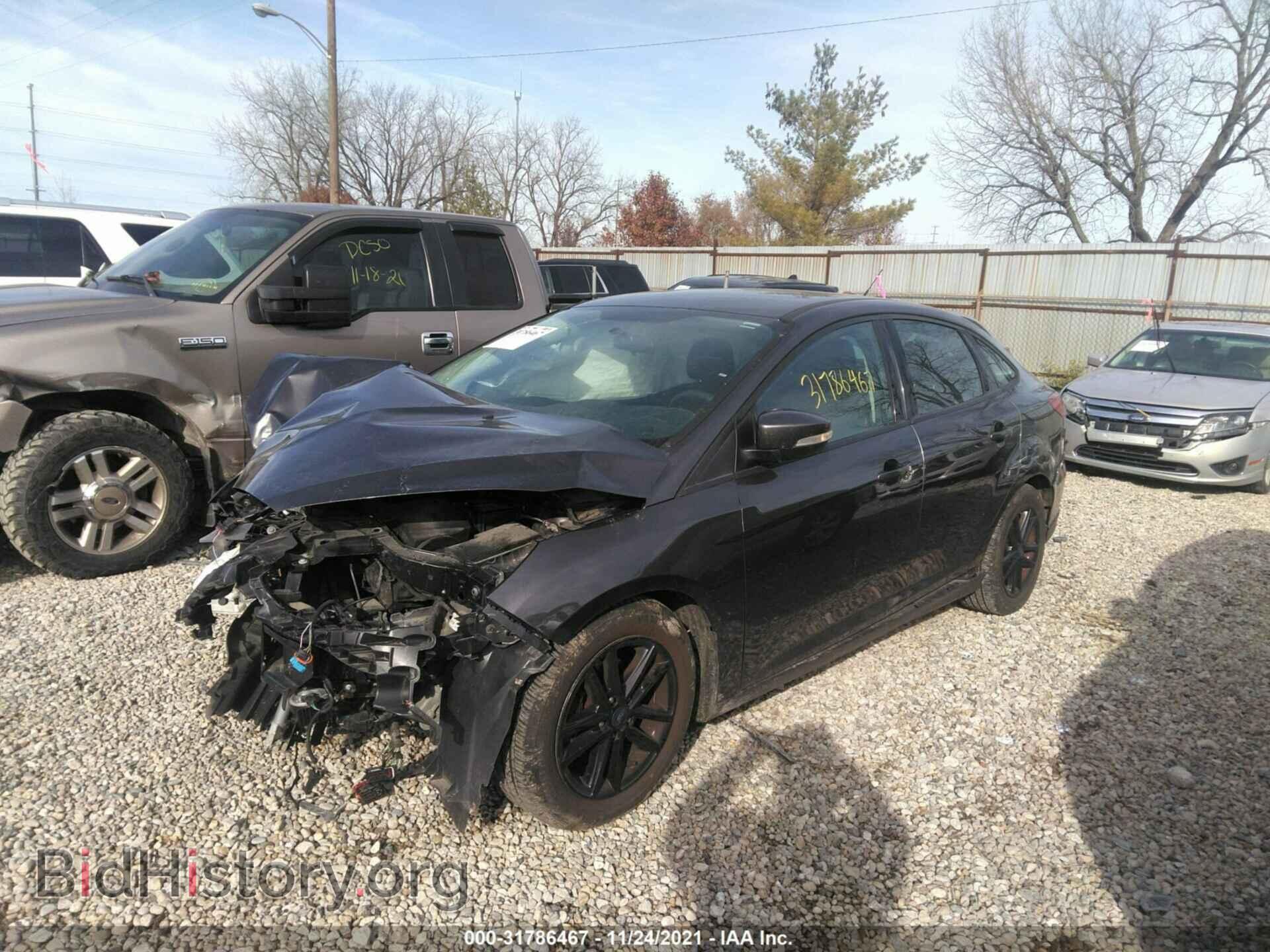 2016 FORD FOCUS - VIN: 1FADP3F24GL309671 - Фото 2