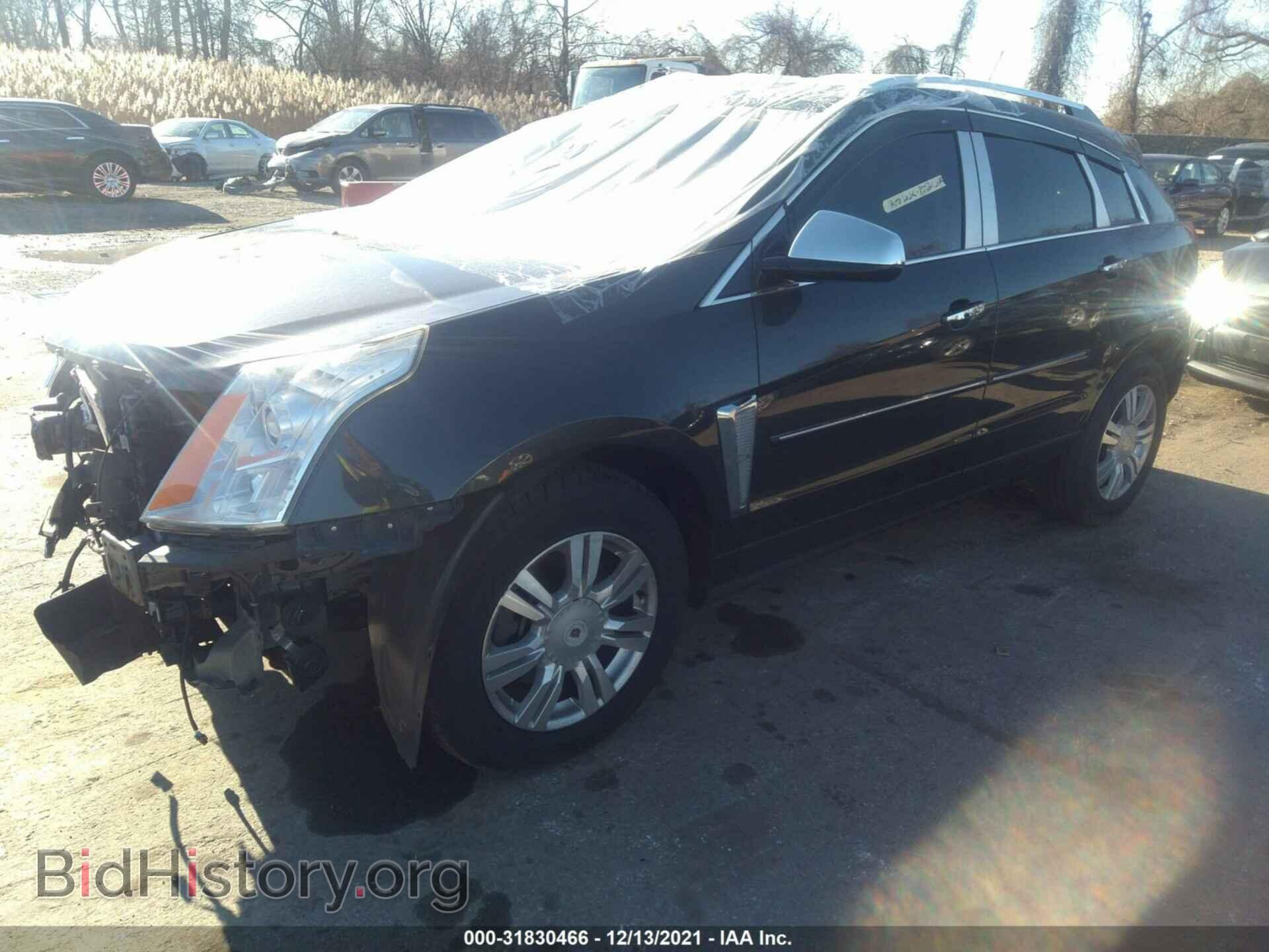 2014 CADILLAC SRX - VIN: 3GYFNEE32ES628017 - Photo 2