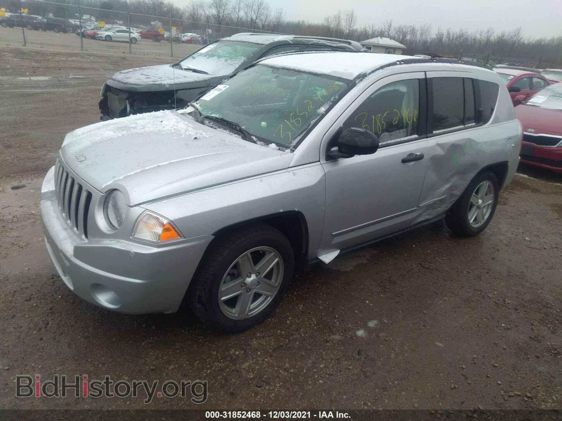 2009 JEEP COMPASS - VIN: 1J8FF47B09D176701 - Photo 2