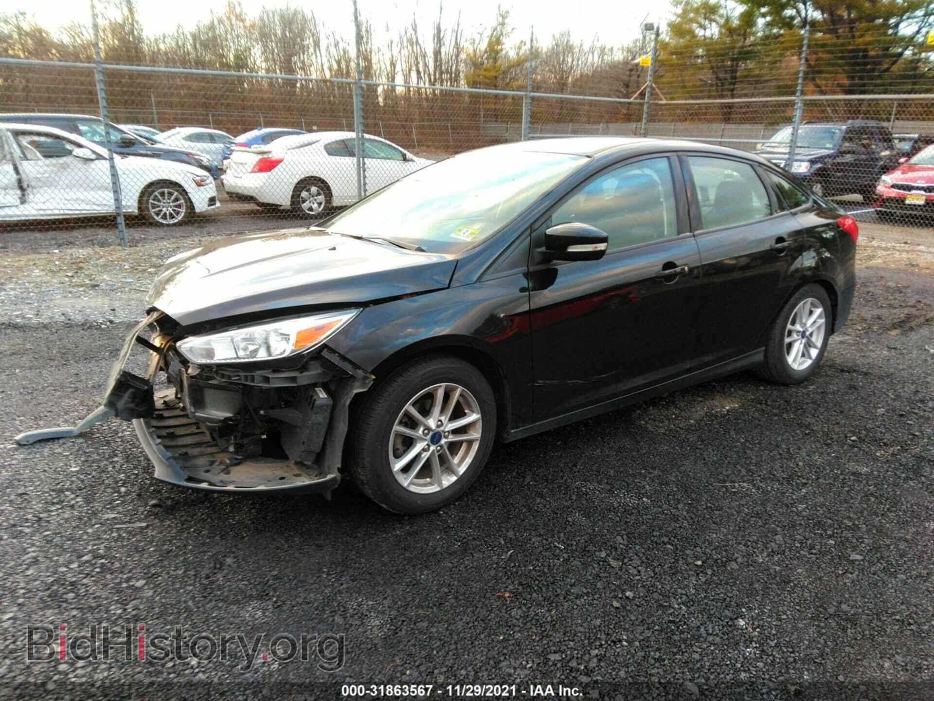 2016 FORD FOCUS - VIN: 1FADP3F22GL304016 - Фото 2