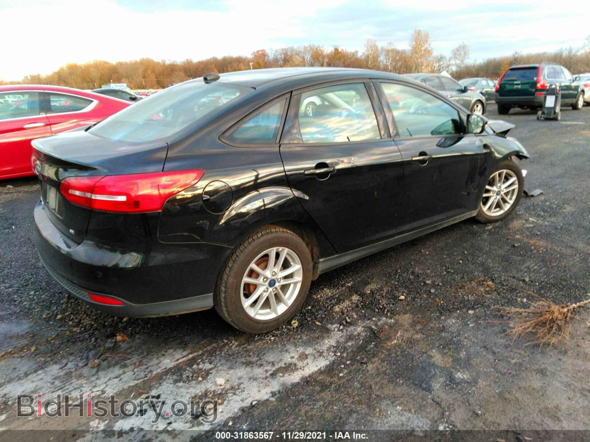 2016 FORD FOCUS - VIN: 1FADP3F22GL304016 - Фото 4
