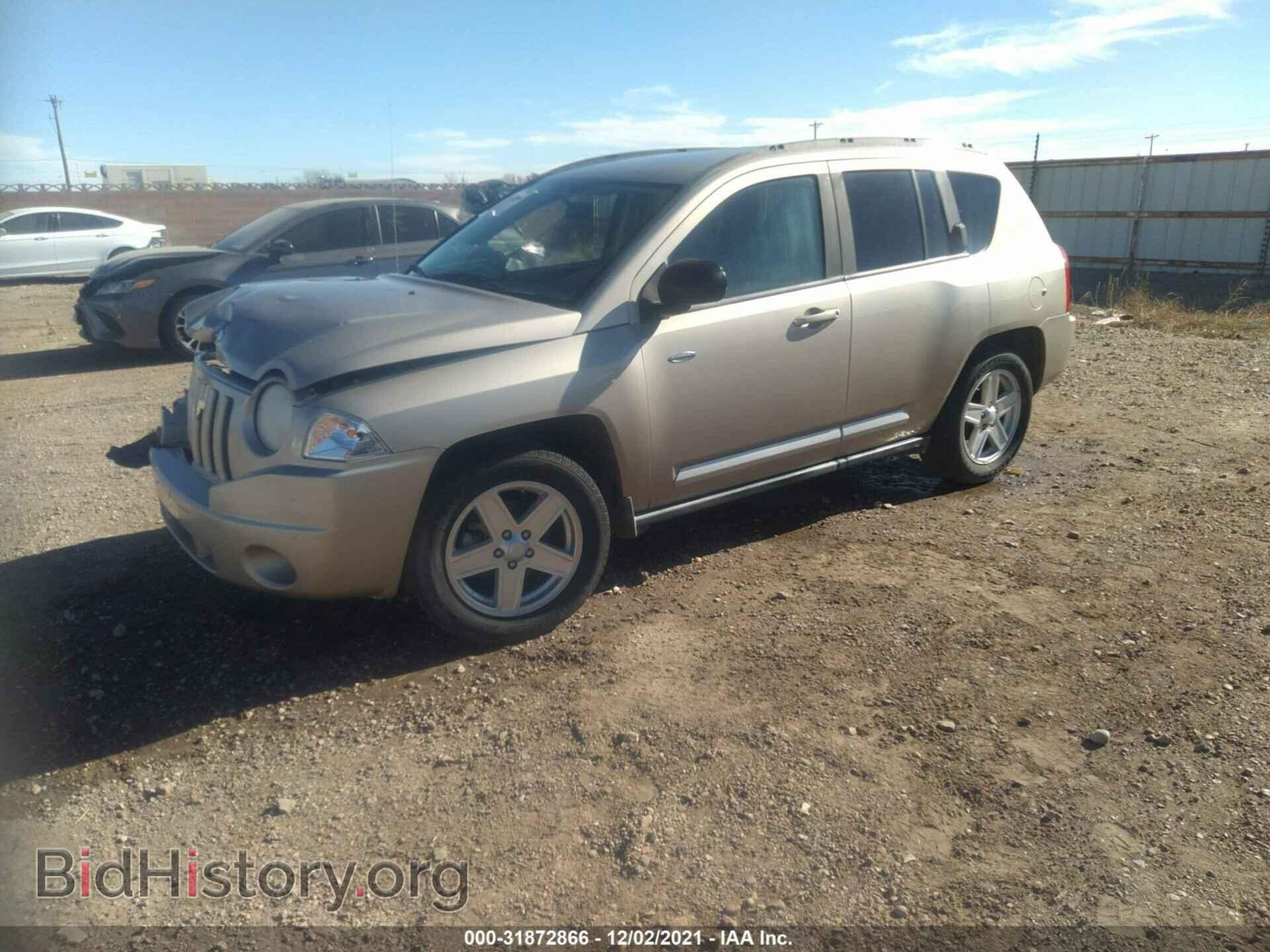 2010 JEEP COMPASS - VIN: 1J4NT1FA2AD621764 - Photo 2