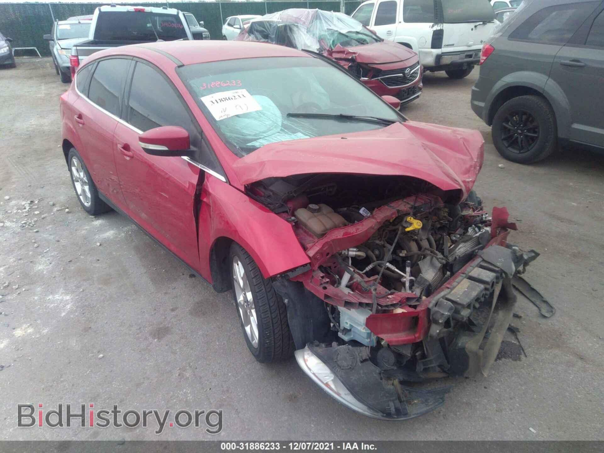 Фотография 1FAHP3M21CL313384 - FORD FOCUS 2012