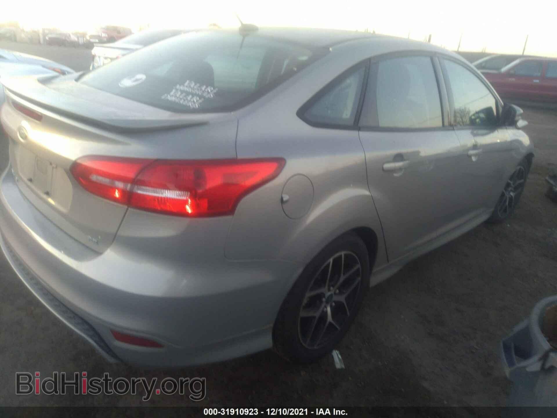 2015 FORD FOCUS - VIN: 1FADP3F2XFL281633 - Photo 4