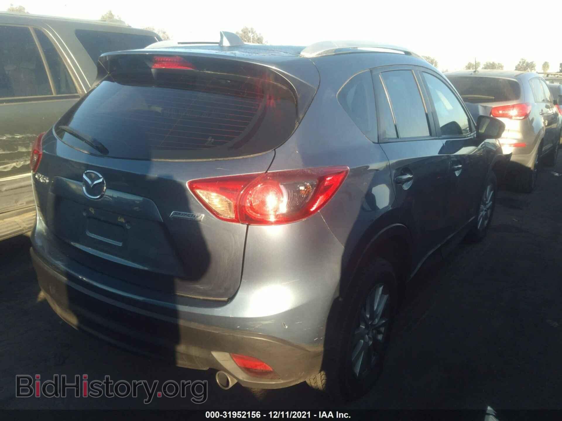 2014 MAZDA CX-5 - VIN: JM3KE2BE1E0420704 - Фото 4