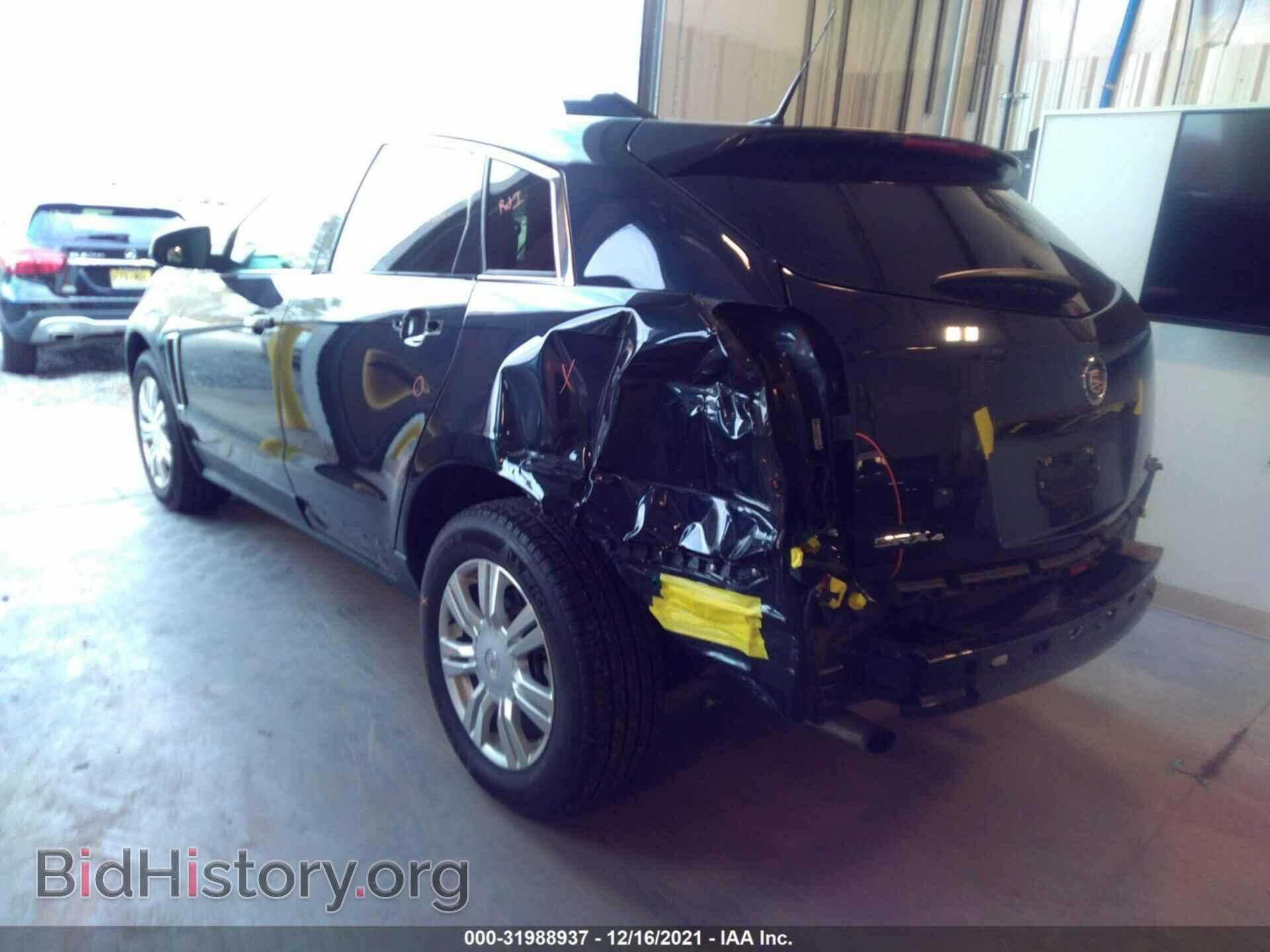 2014 CADILLAC SRX - VIN: 3GYFNEE33ES657462 - Фото 3