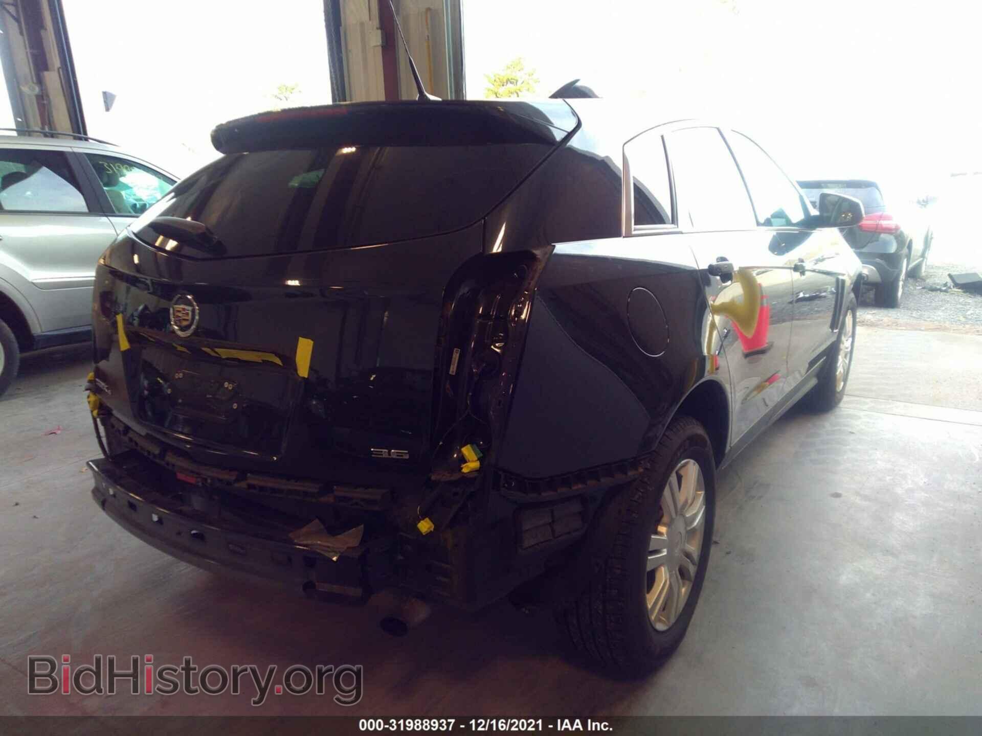 2014 CADILLAC SRX - VIN: 3GYFNEE33ES657462 - Фото 4