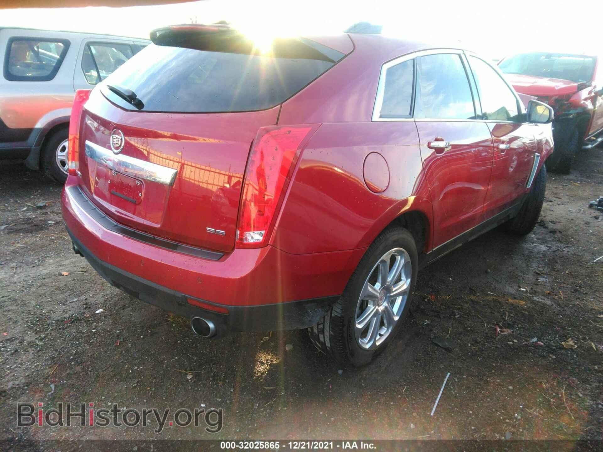 2014 CADILLAC SRX - VIN: 3GYFNDE35ES550312 - Фото 4