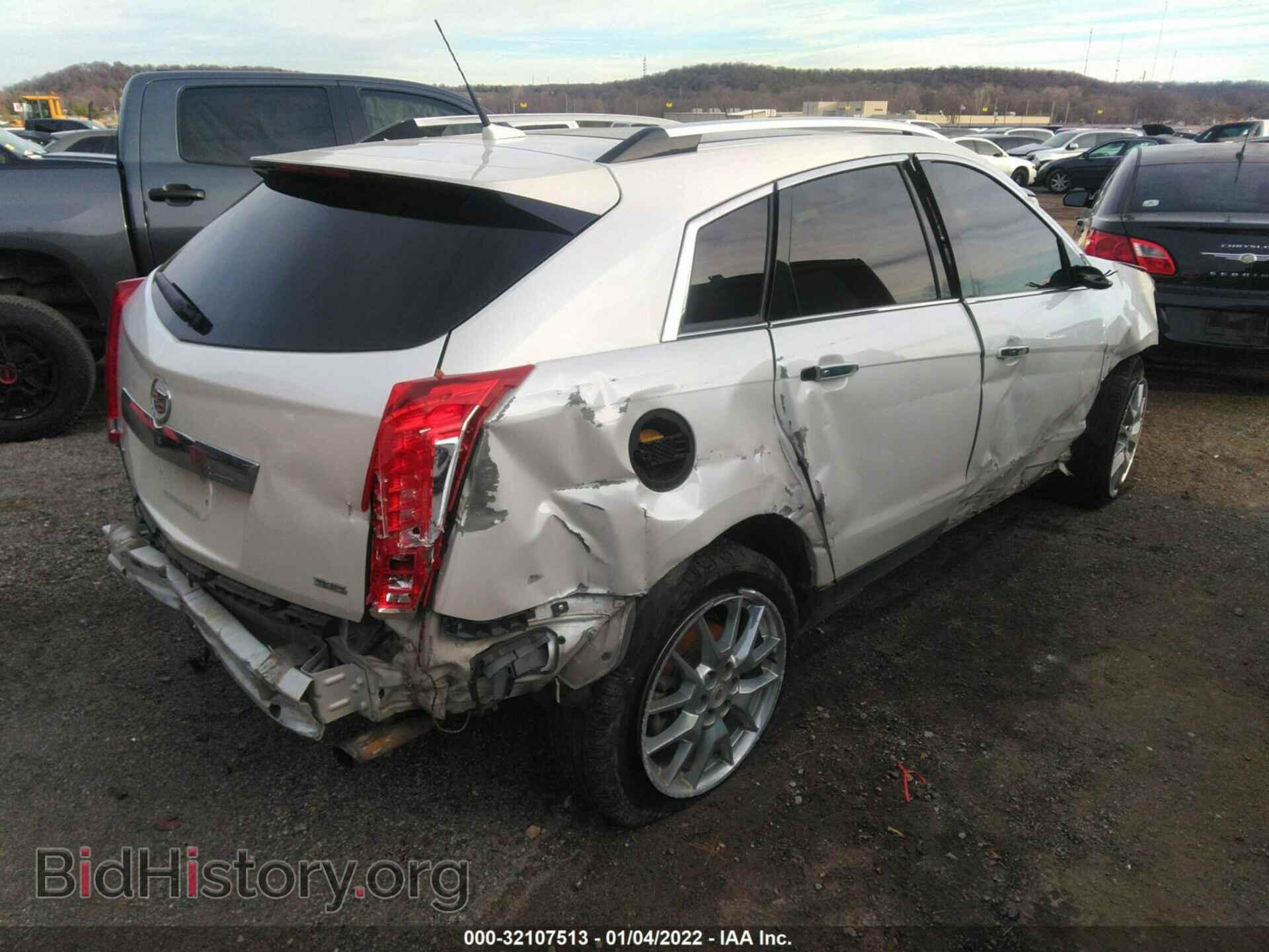 2013 CADILLAC SRX - VIN: 3GYFNDE35DS537980 - Фото 4