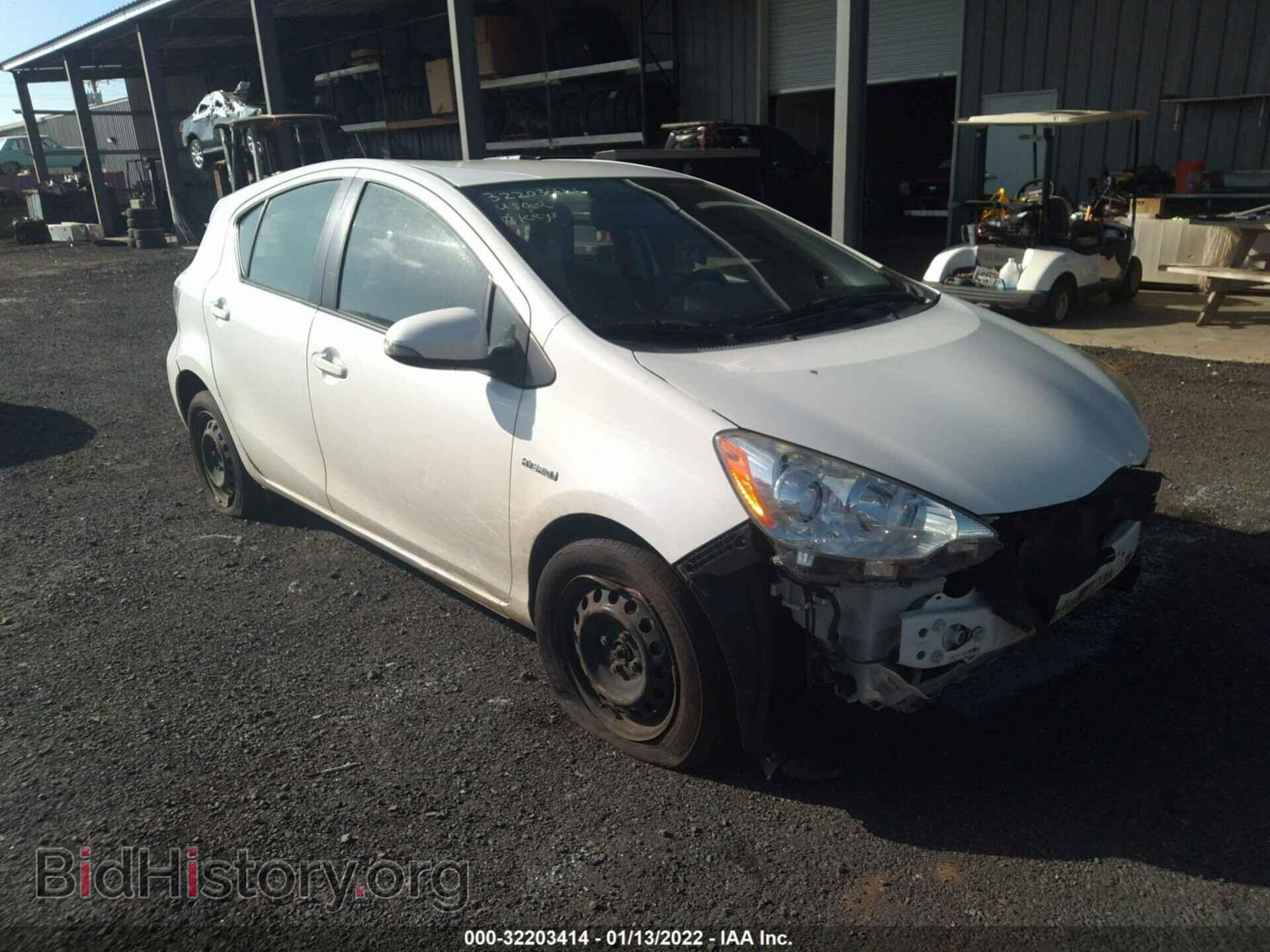 Фотография JTDKDTB30D1549994 - TOYOTA PRIUS C 2013