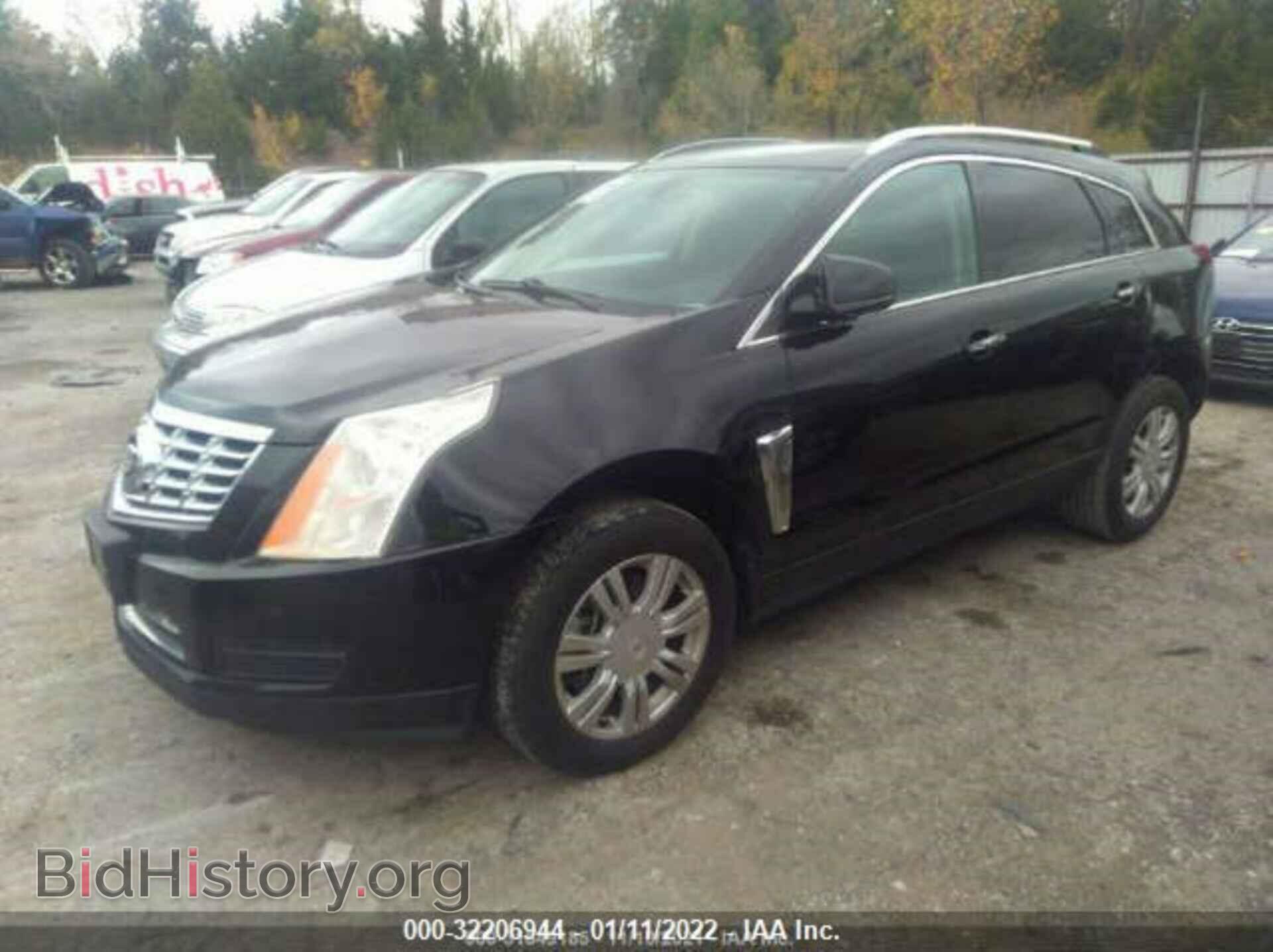 2013 CADILLAC SRX - VIN: 3GYFNCE36DS597681 - Фото 2