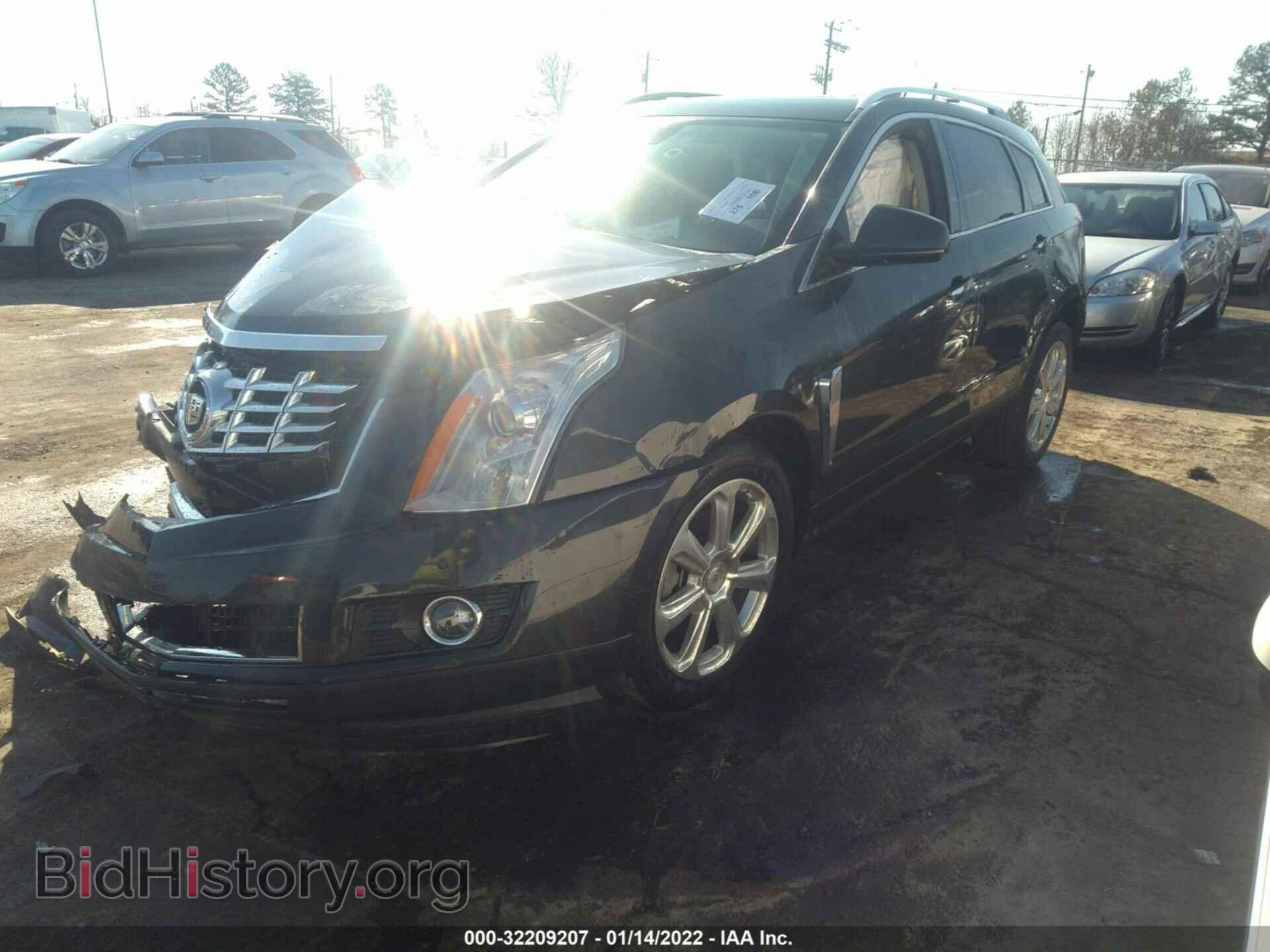2014 CADILLAC SRX - VIN: 3GYFNCE36ES631474 - Фото 2