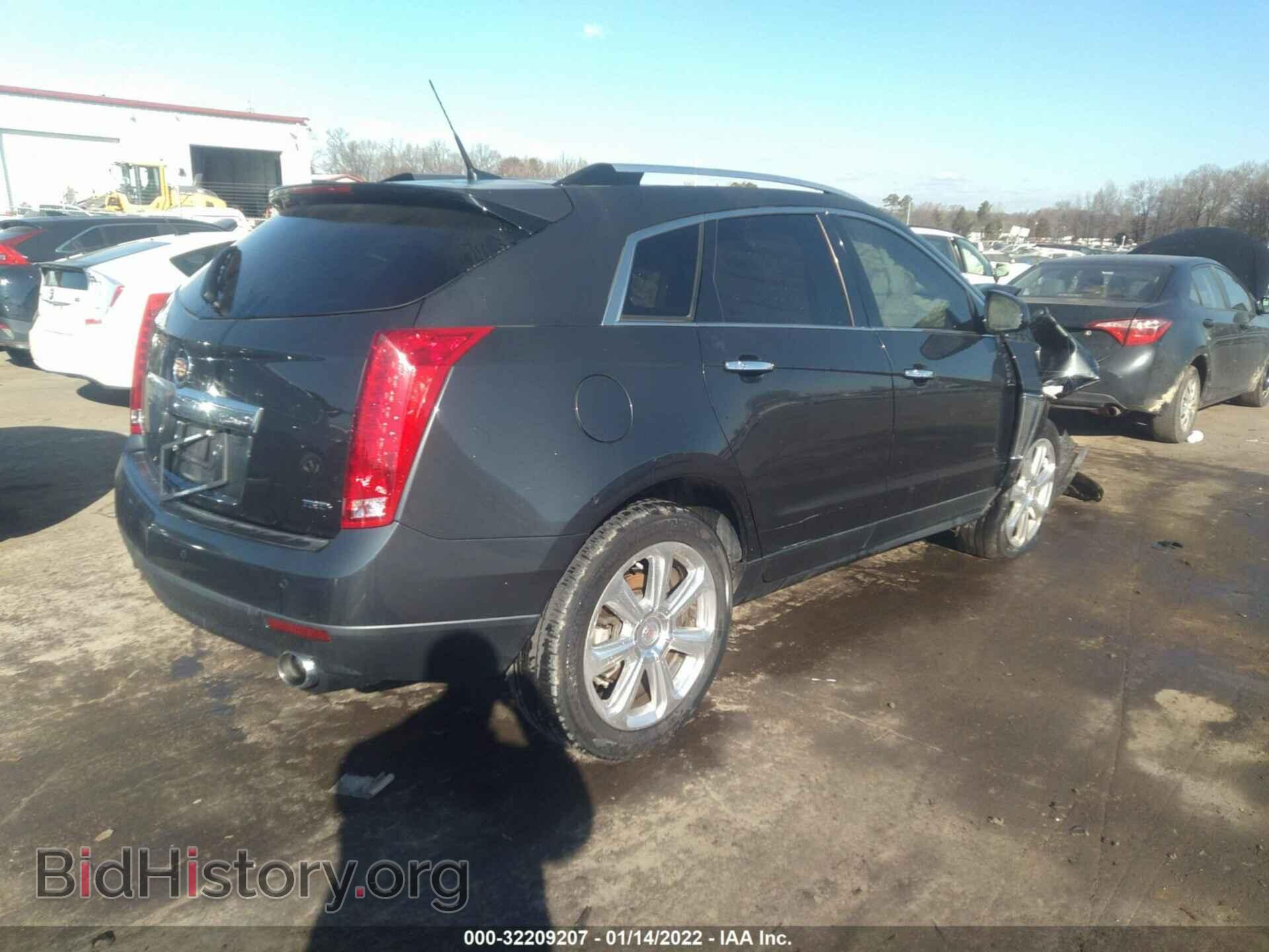 2014 CADILLAC SRX - VIN: 3GYFNCE36ES631474 - Фото 4