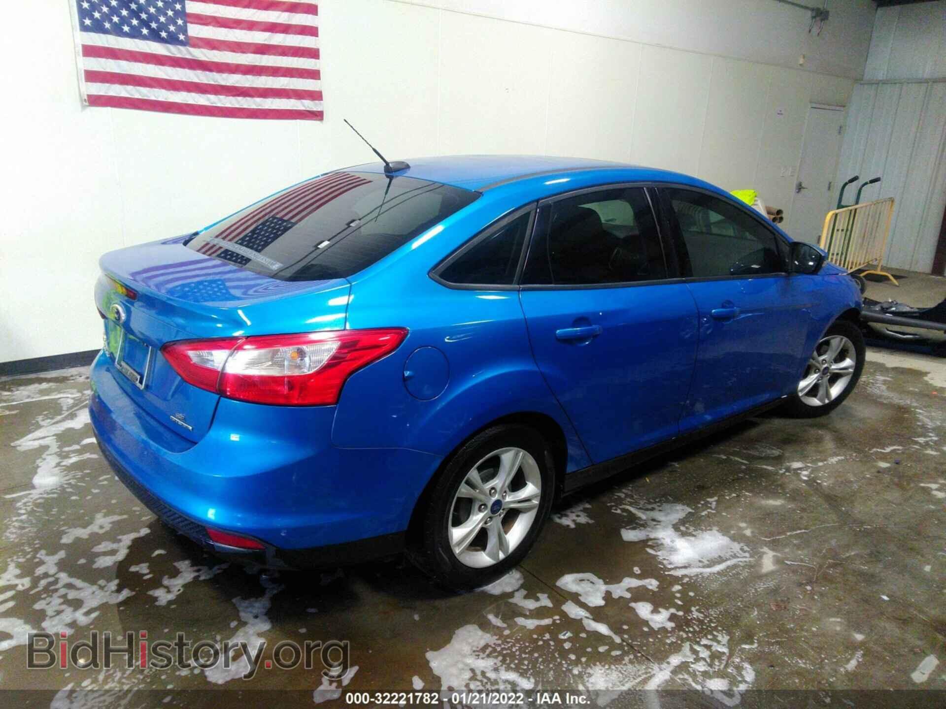 2014 FORD FOCUS - VIN: 1FADP3F21EL404007 - Photo 4