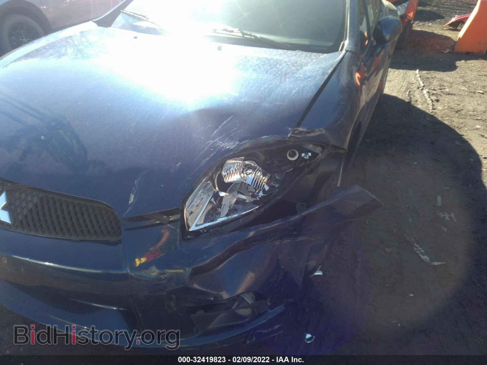 2009 MITSUBISHI ECLIPSE - VIN: 4A3AL25F19E042386 - Photo 6