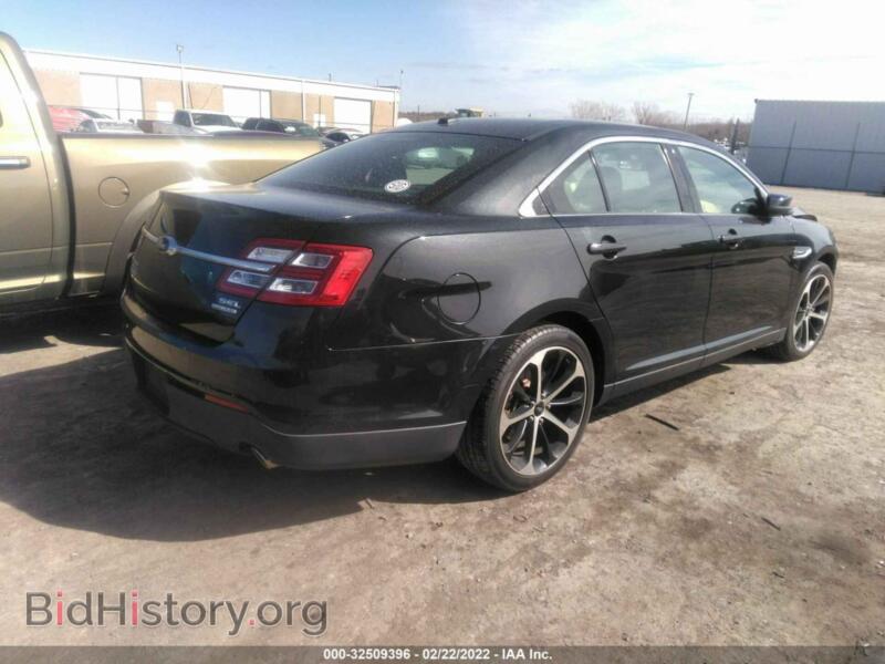 2014 Ford TAURUS (VIN 1FAHP2E8XEG126640) — photo 4 of 11