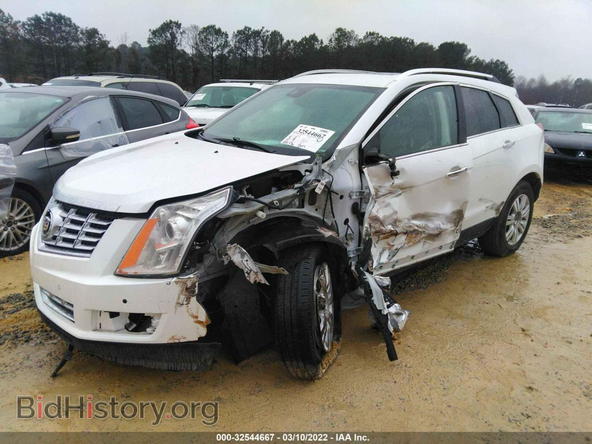 2016 CADILLAC SRX - VIN: 3GYFNBE3XGS566366 - Фото 2