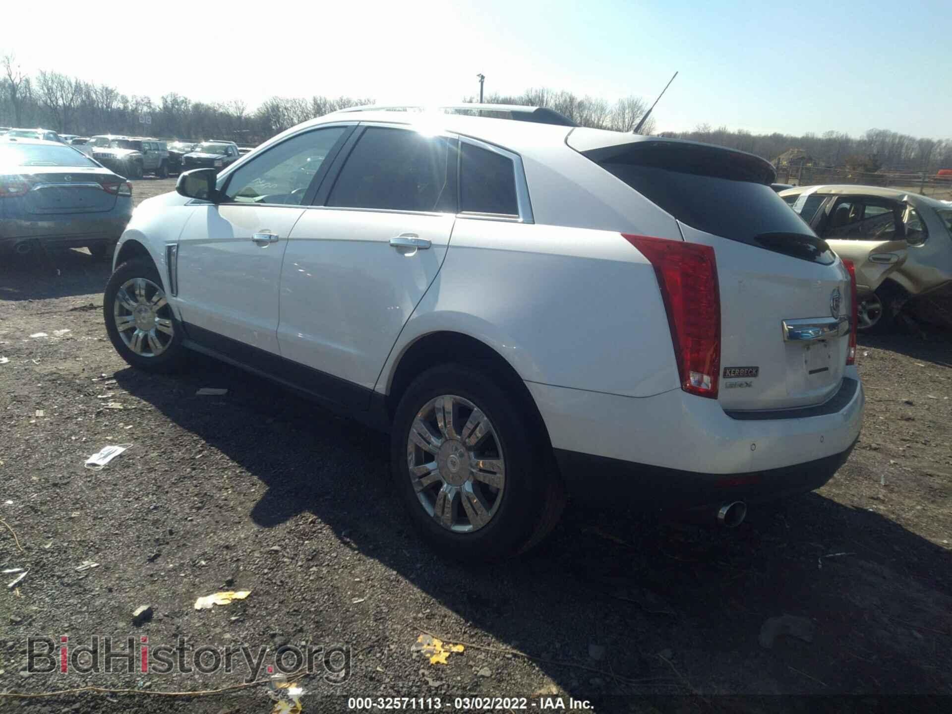 2013 CADILLAC SRX - VIN: 3GYFNCE3XDS648633 - Фото 3