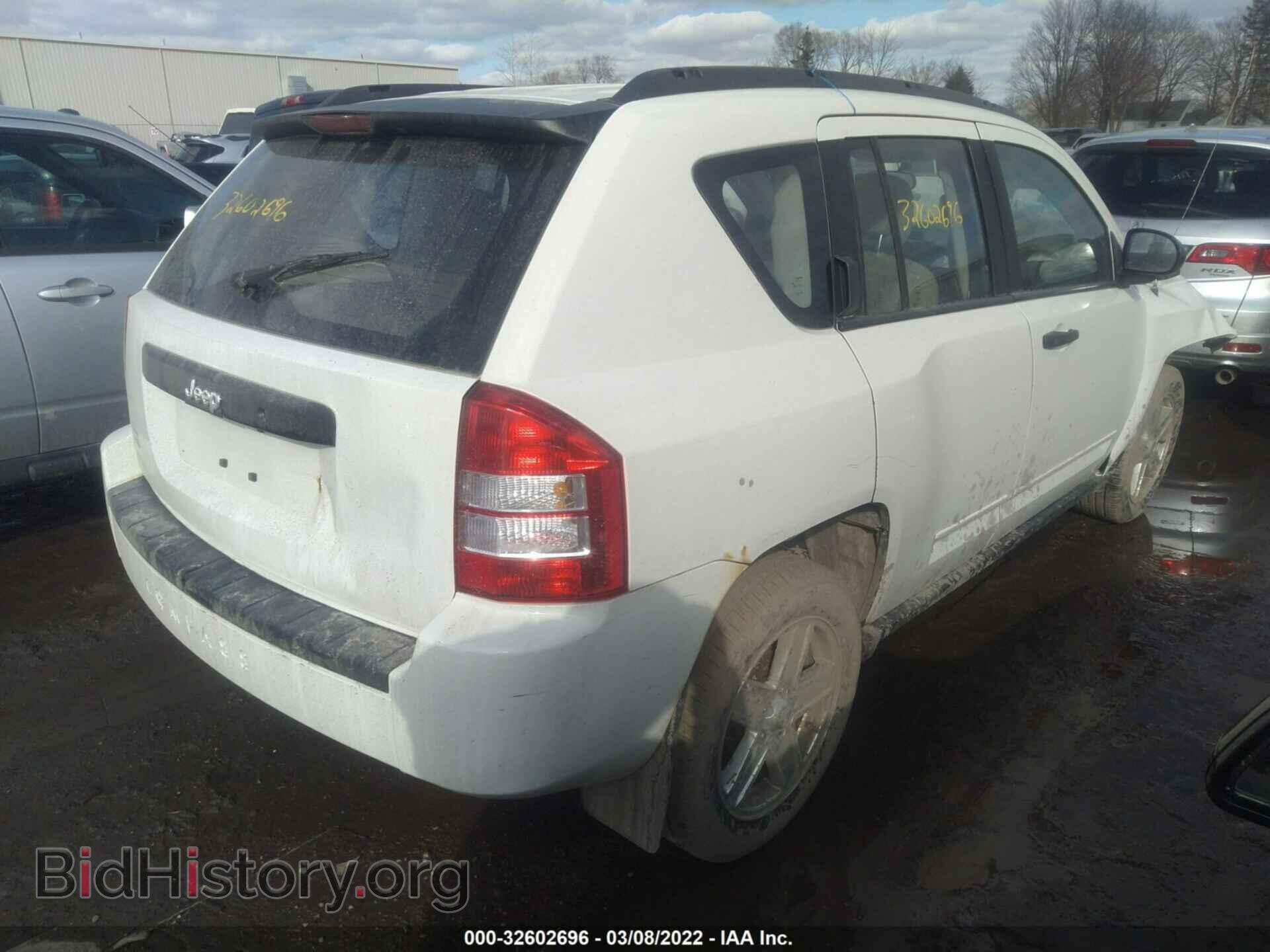 2010 JEEP COMPASS - VIN: 1J4NT4FA0AD556060 - Фото 4