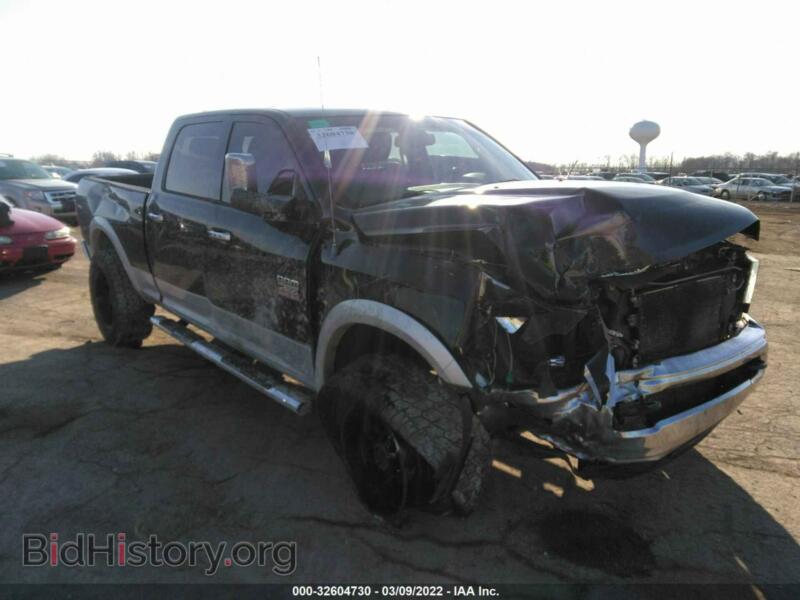 2012 RAM 2500 Laramie (VIN 3C6UD5FL7CG312053) — photo 1 of 11, IAAI, damage: right front
