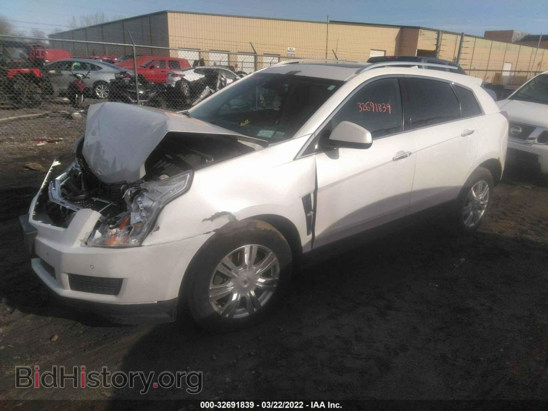 2012 CADILLAC SRX - VIN: 3GYFNDE39CS559334 - Фото 2