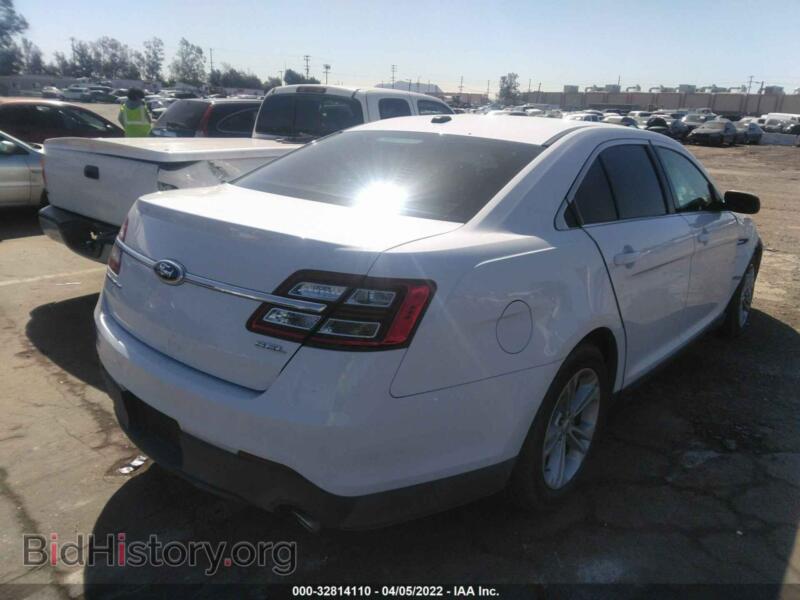 2014 Ford TAURUS (VIN 1FAHP2E81EG100623) — фото 4 из 11