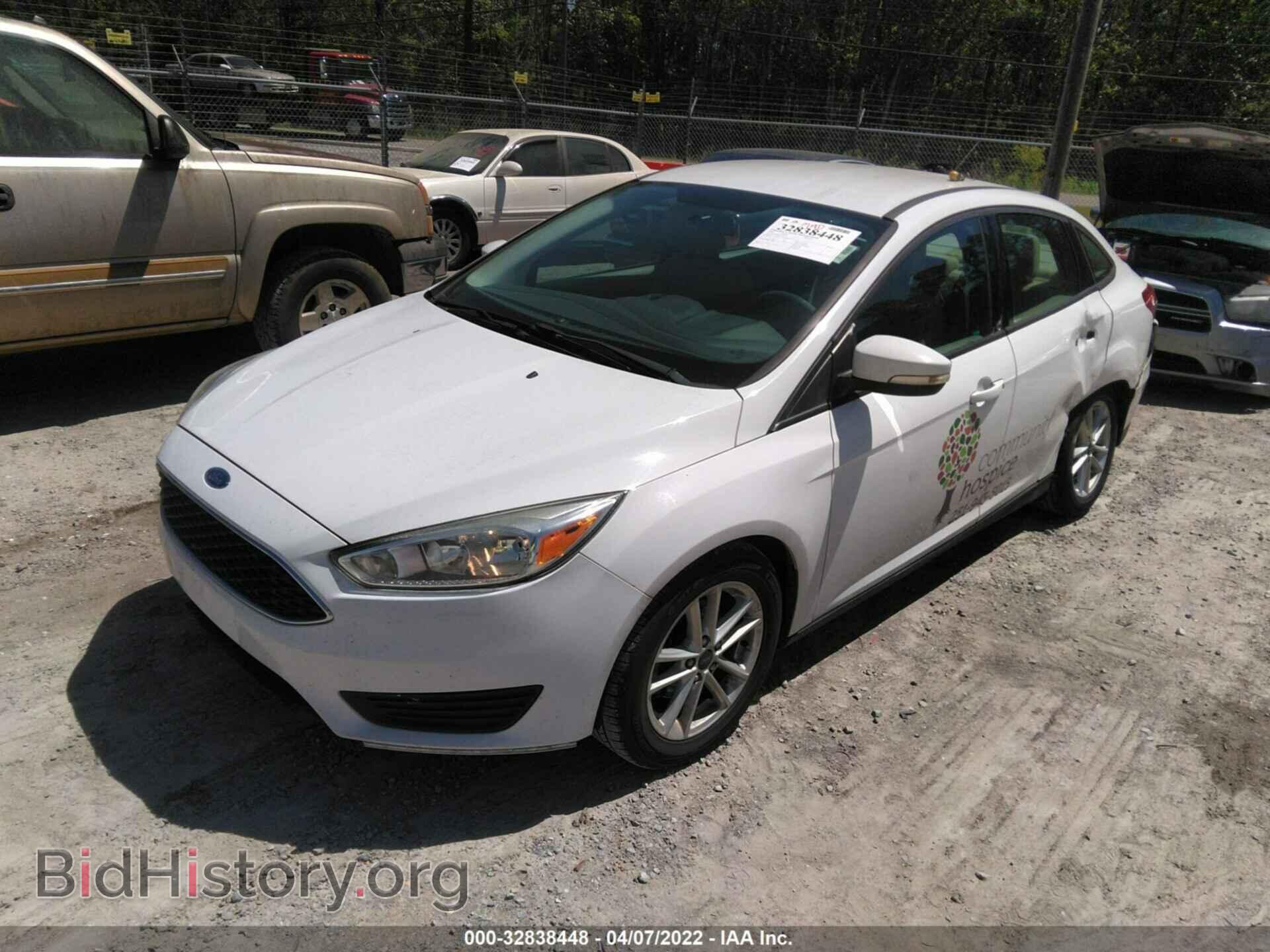 2016 FORD FOCUS - VIN: 1FADP3F22GL291302 - Фото 2