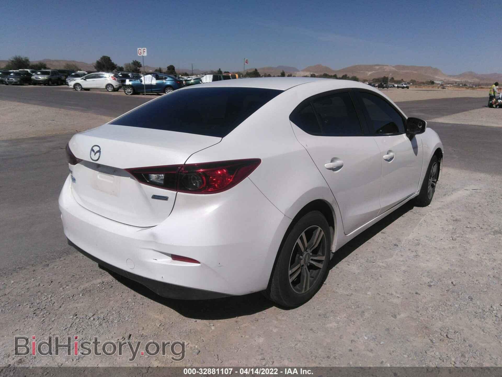 2014 MAZDA MAZDA3 - VIN: JM1BM1U70E1128654 - Фото 4