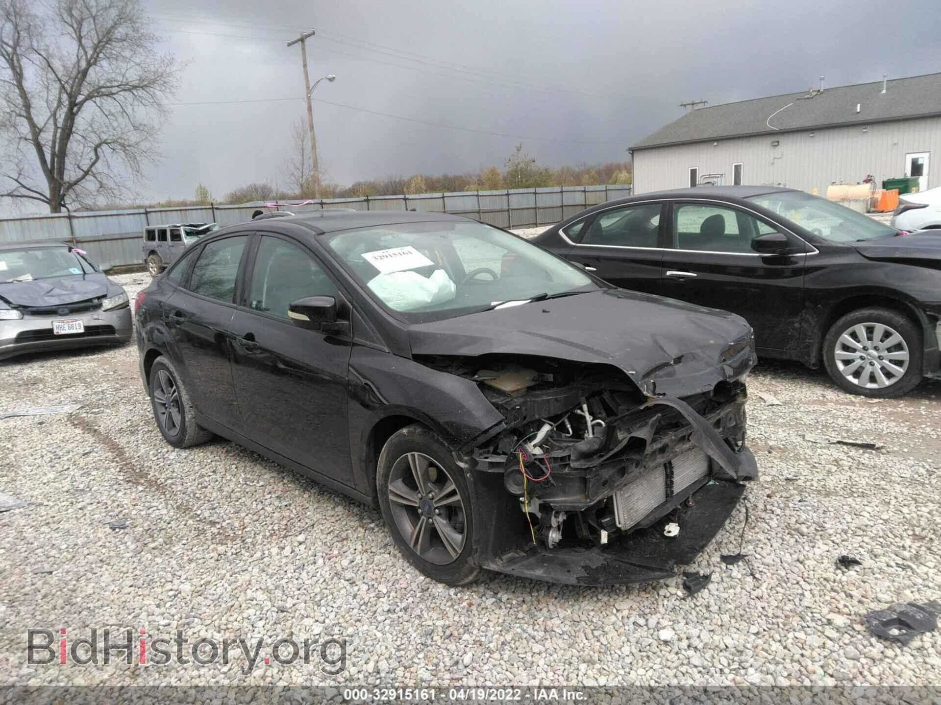 Фотография 1FADP3F25EL106530 - FORD FOCUS 2014