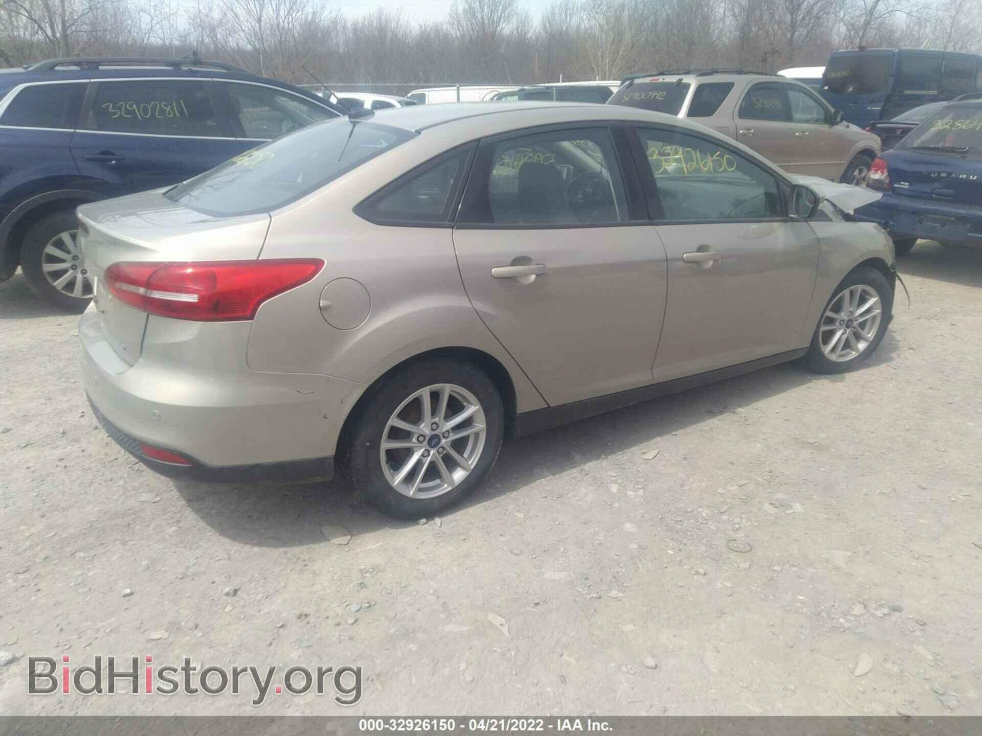 2016 FORD FOCUS - VIN: 1FADP3F22GL334858 - Photo 4