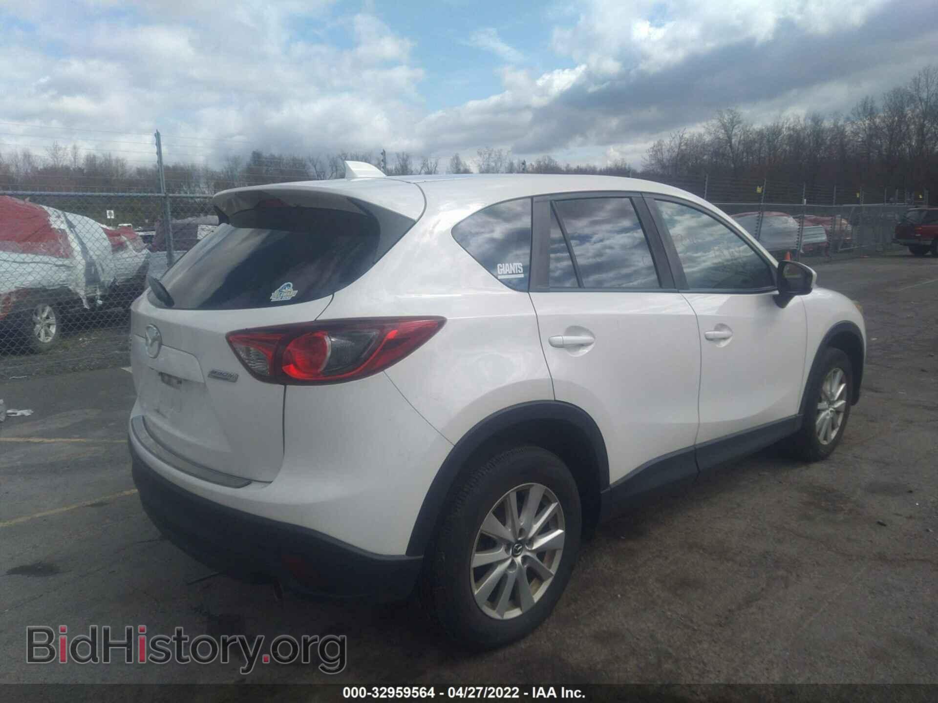 2014 MAZDA CX-5 - VIN: JM3KE4CY4E0317569 - Фото 4