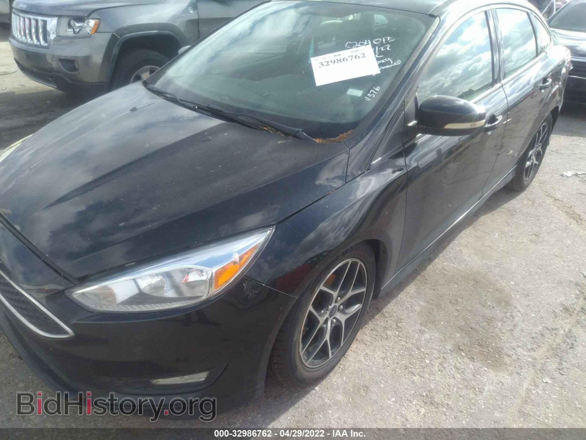 2015 FORD FOCUS - VIN: 1FADP3F22FL254376 - Photo 2