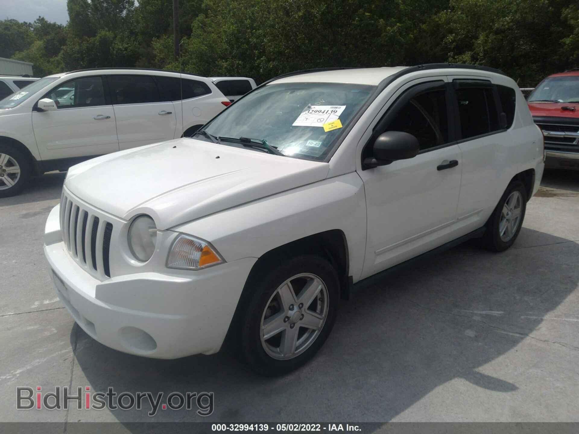 2010 JEEP COMPASS - VIN: 1J4NT4FA2AD516210 - Photo 2
