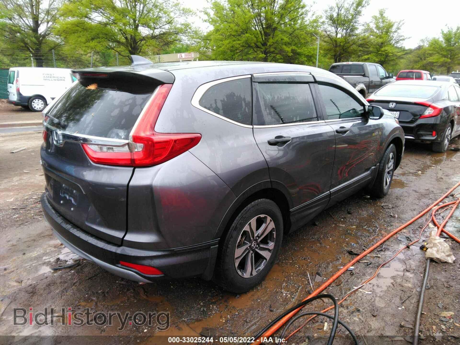 2017 HONDA CR-V - VIN: 7FARW5H37HE000290 - Фото 4