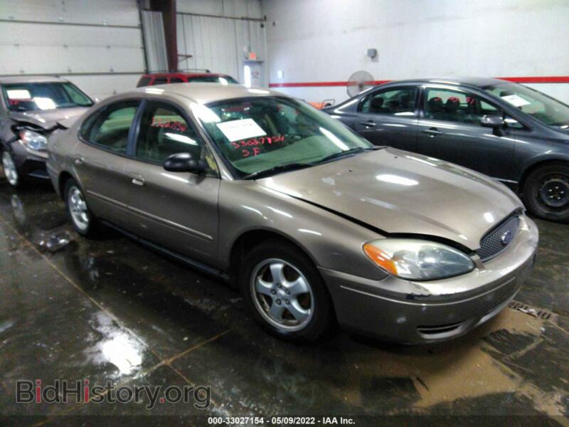 2006 Ford TAURUS SE (VIN 1FAFP53U06A105082) — photo 1 of 11, IAAI, damage: front & rear