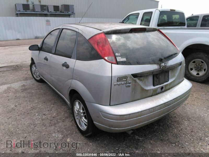 2006 Ford FOCUS (VIN 1FAFP37N76W148585) — photo 3 of 11