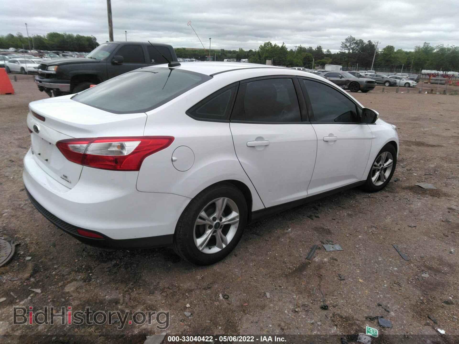 2014 FORD FOCUS - VIN: 1FADP3F23EL287935 - Photo 4
