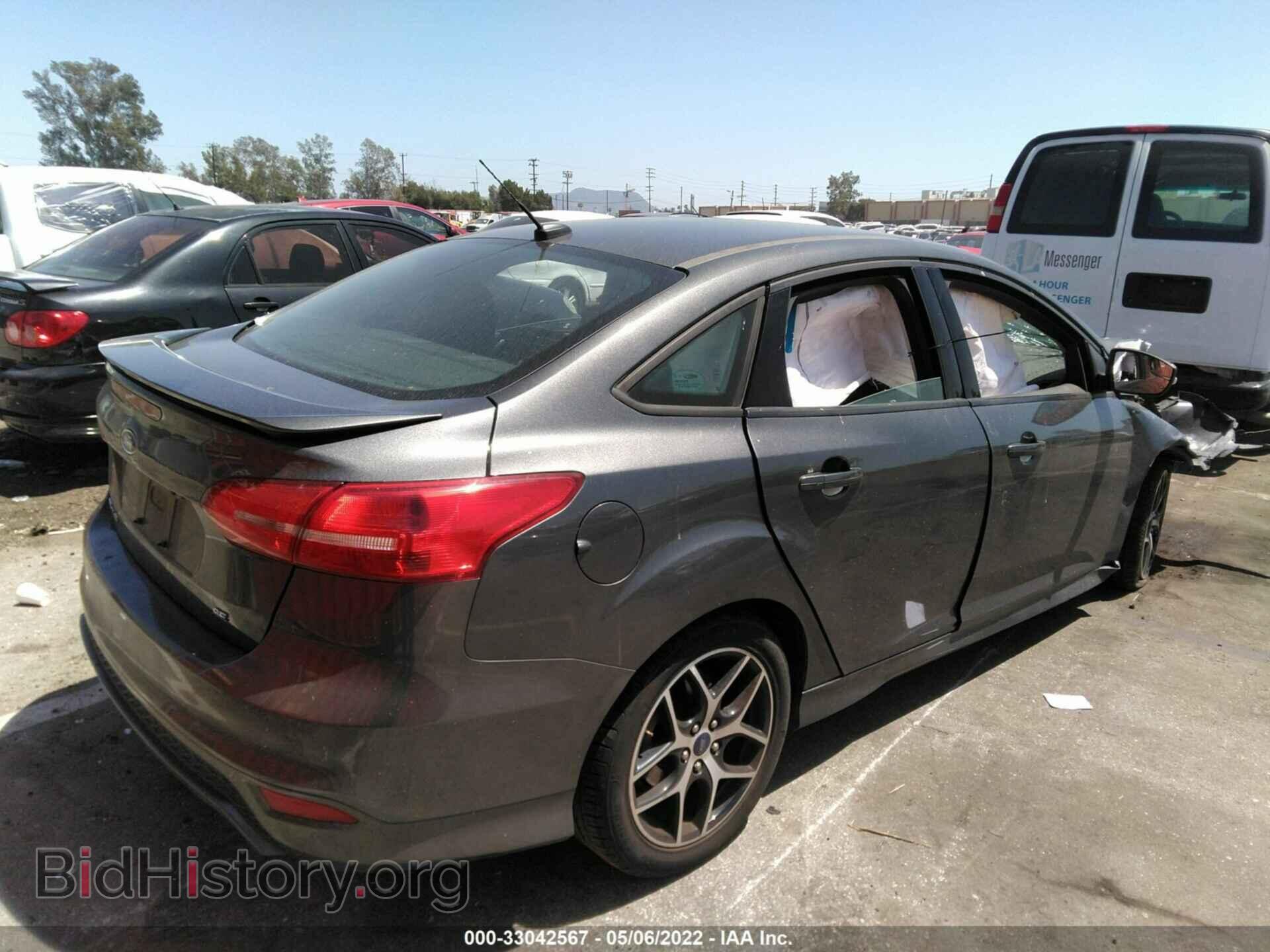 2016 FORD FOCUS - VIN: 1FADP3F21GL374462 - Photo 4