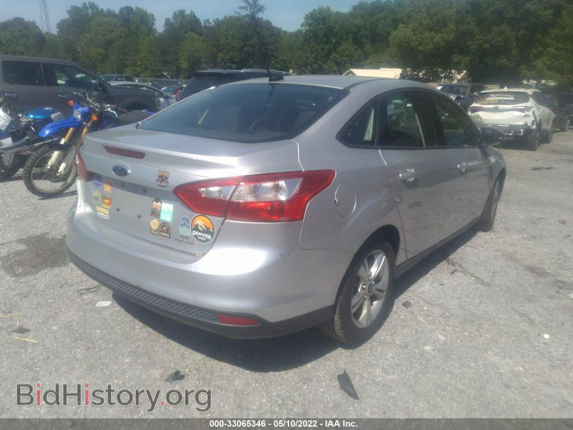 2014 FORD FOCUS - VIN: 1FADP3F22EL242100 - Photo 4