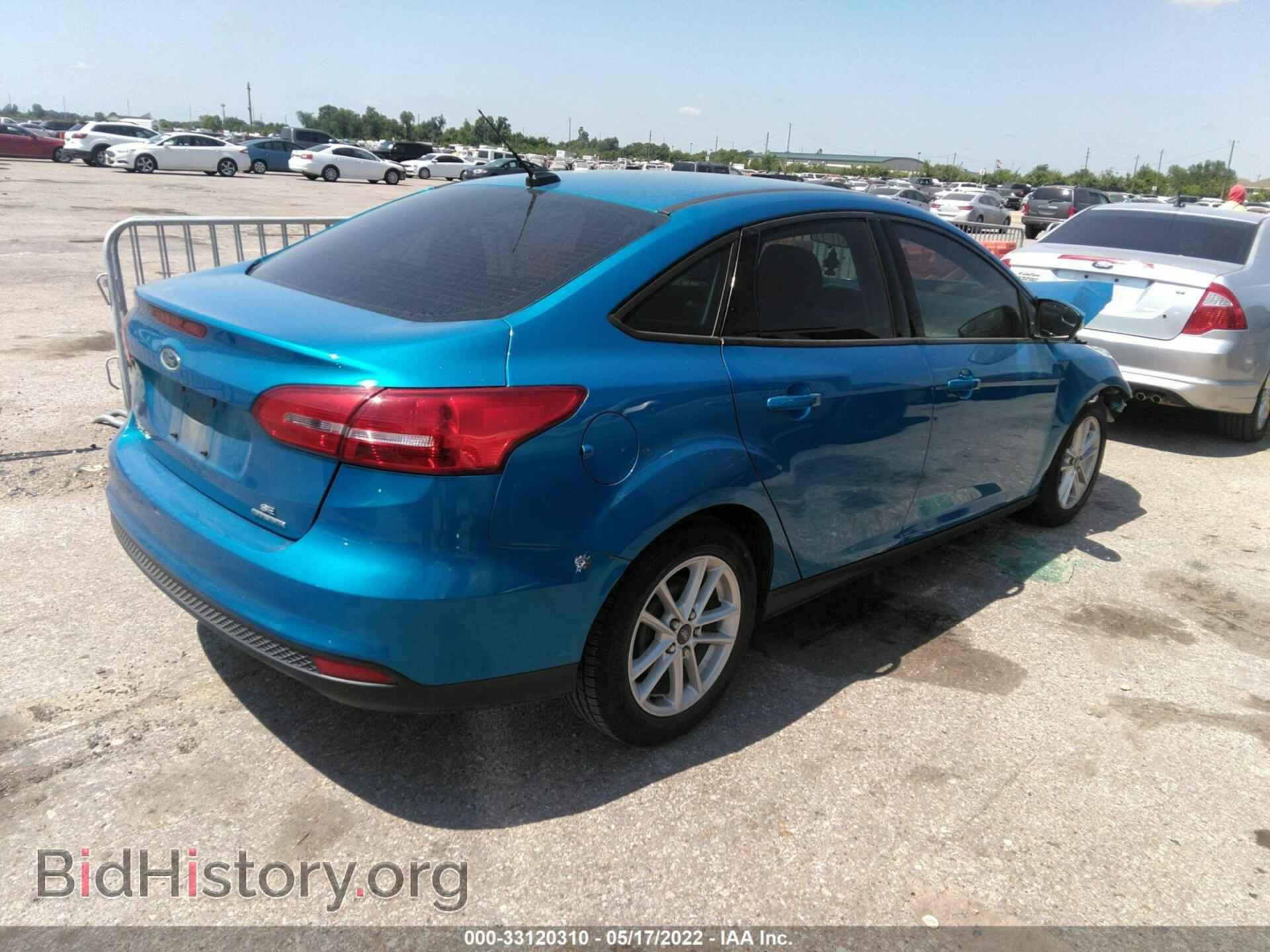 2016 FORD FOCUS - VIN: 1FADP3F21GL404480 - Photo 4