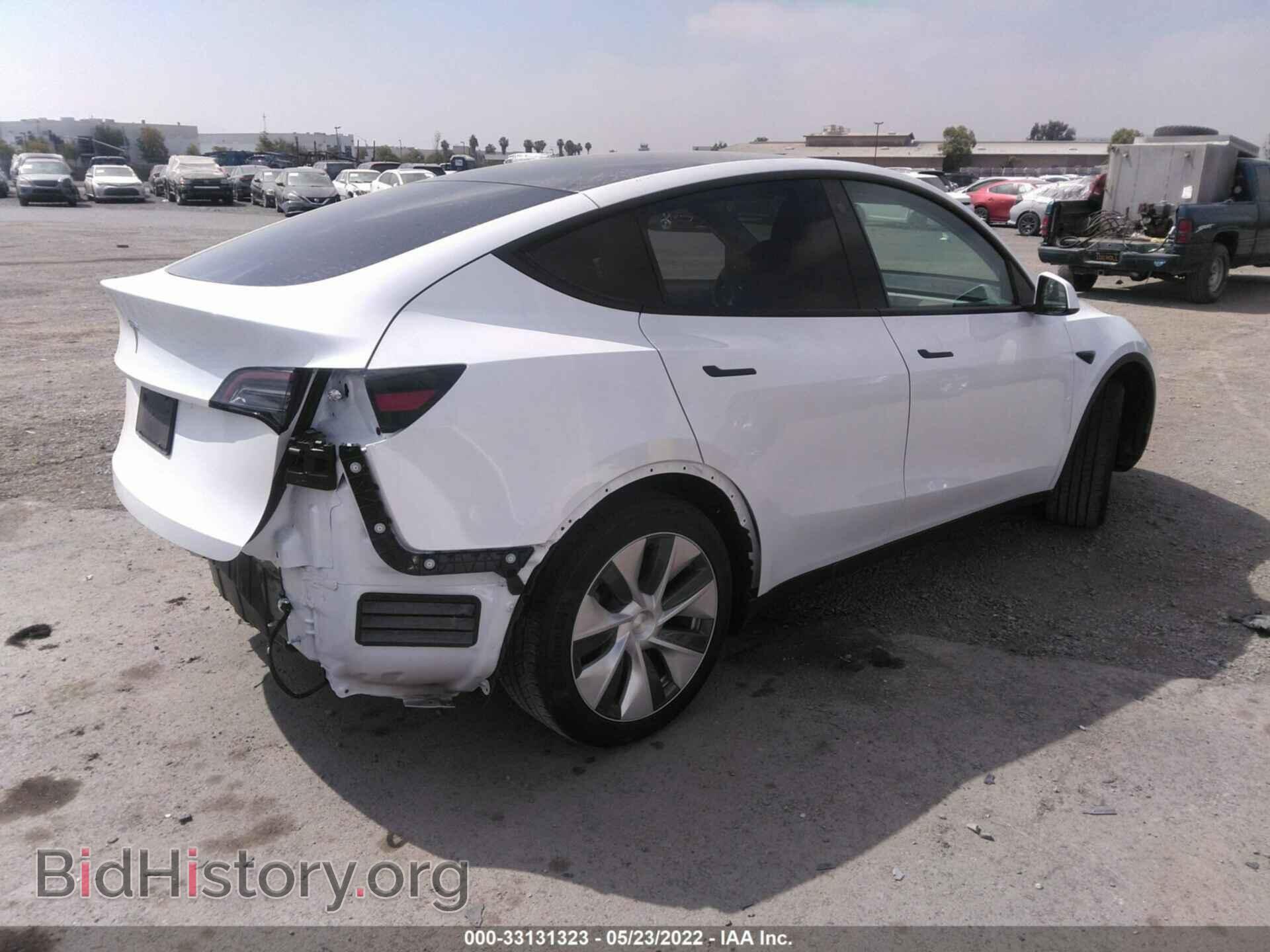 2021 TESLA MODEL Y - VIN: 5YJYGDED8MF107337 - Photo 4