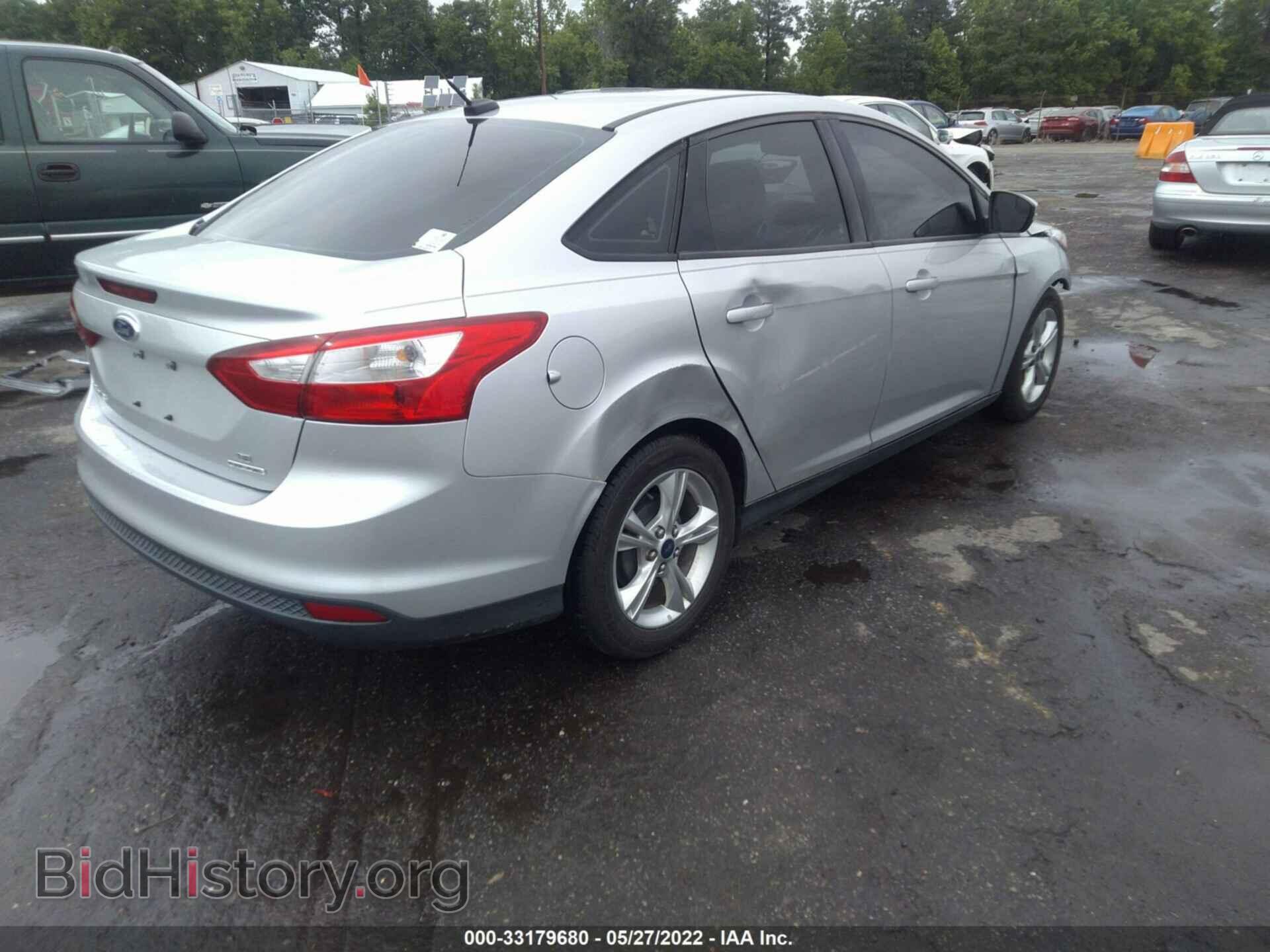 2014 FORD FOCUS - VIN: 1FADP3F2XEL271943 - Photo 4