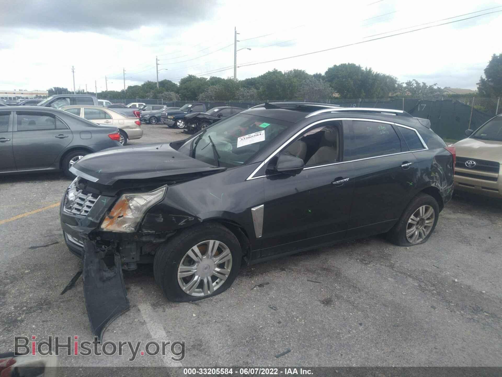 2014 CADILLAC SRX - VIN: 3GYFNBE35ES560052 - Фото 2